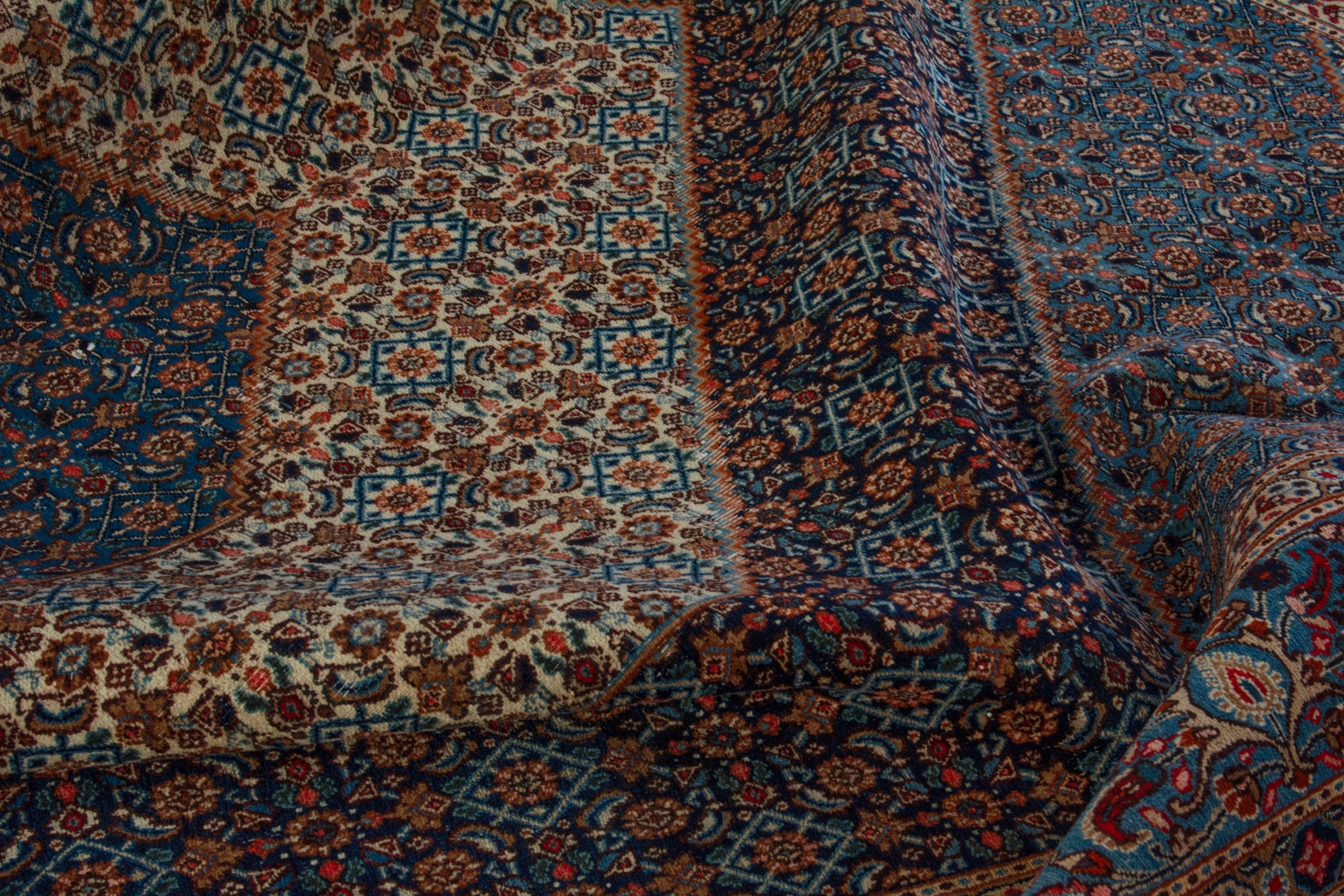 Persian Birjand oversized rug in dark blue and cream, view 16 of 21