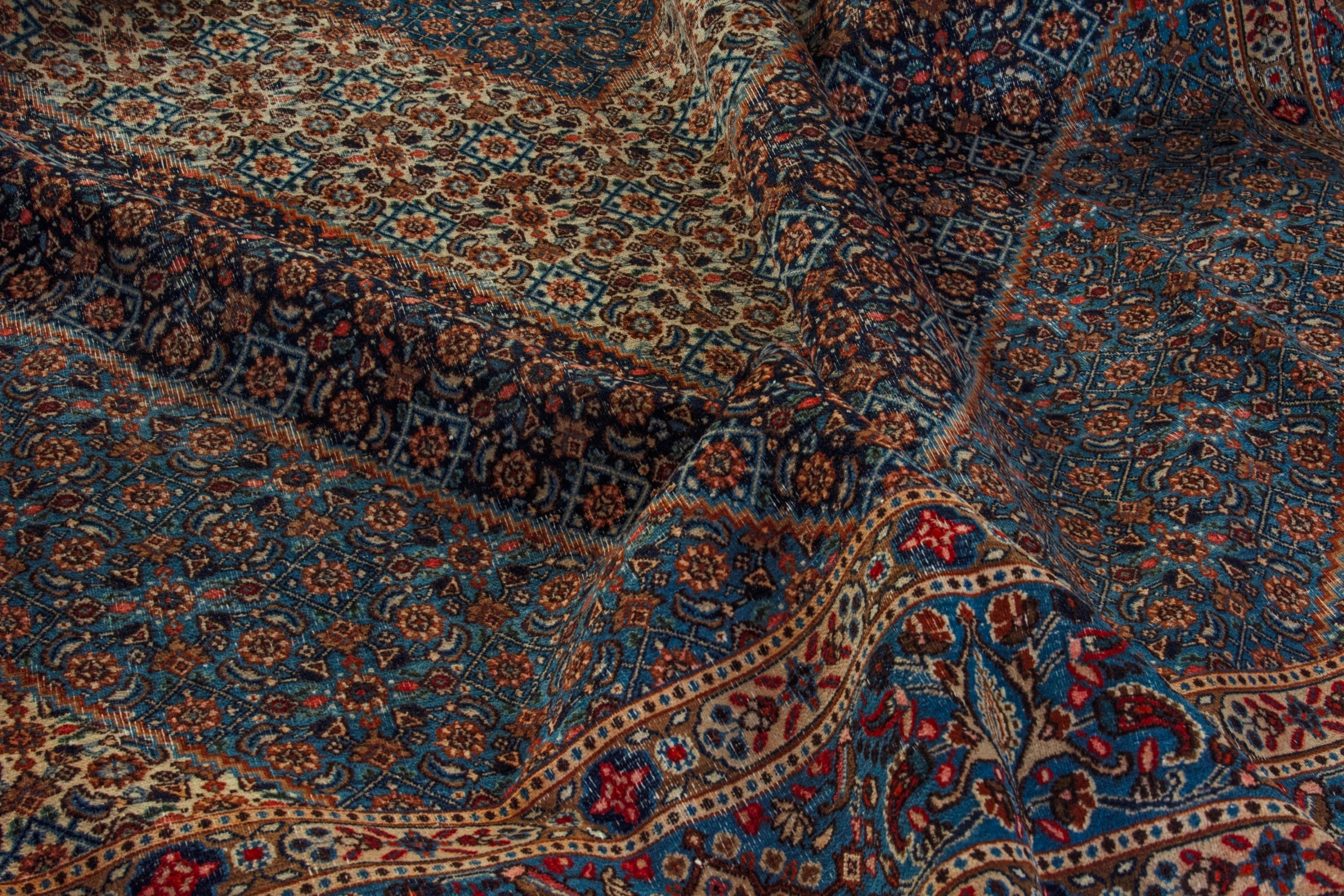 Persian Birjand oversized rug in dark blue and cream, view 18 of 21