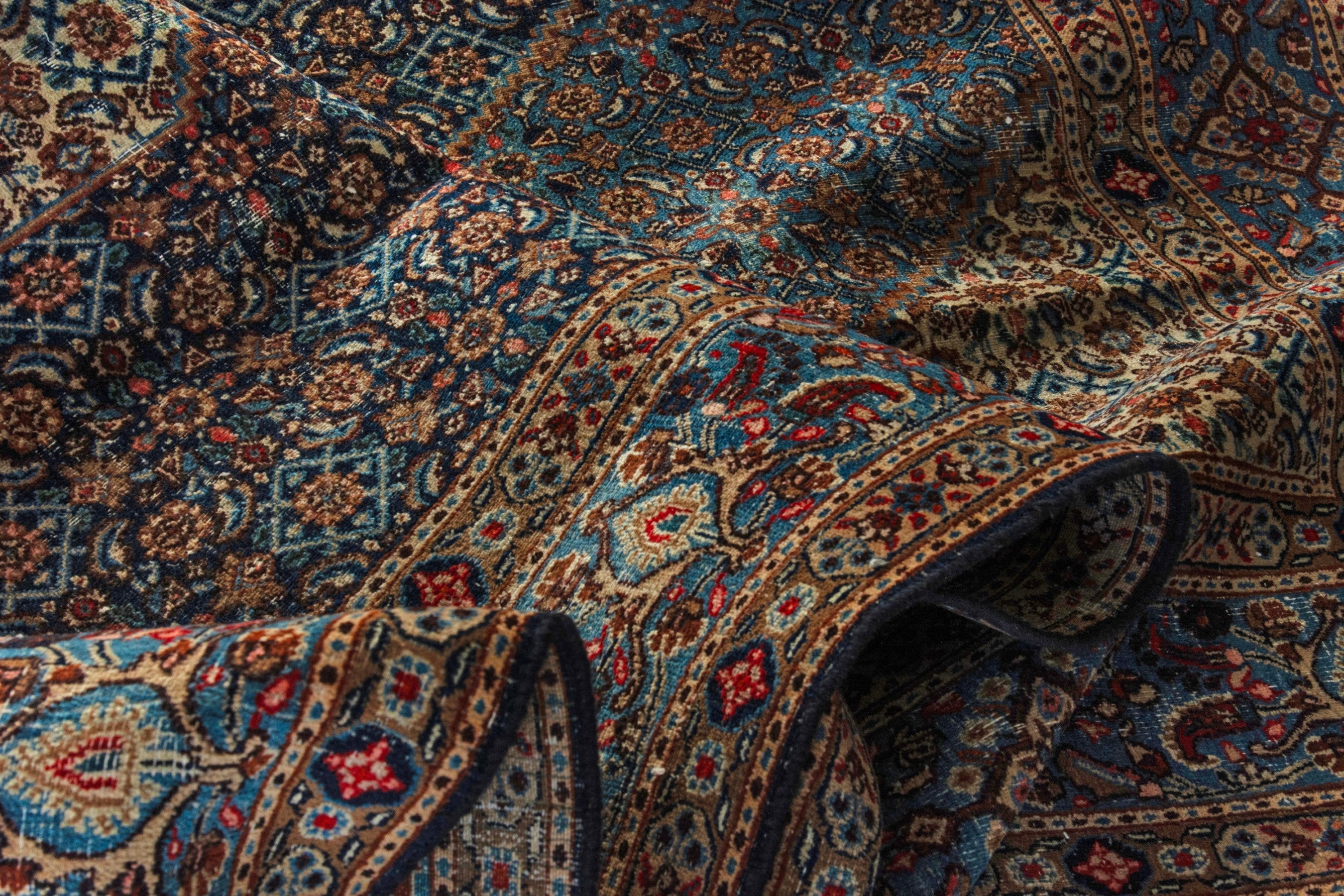 Persian Birjand oversized rug in dark blue and cream, view 19 of 21