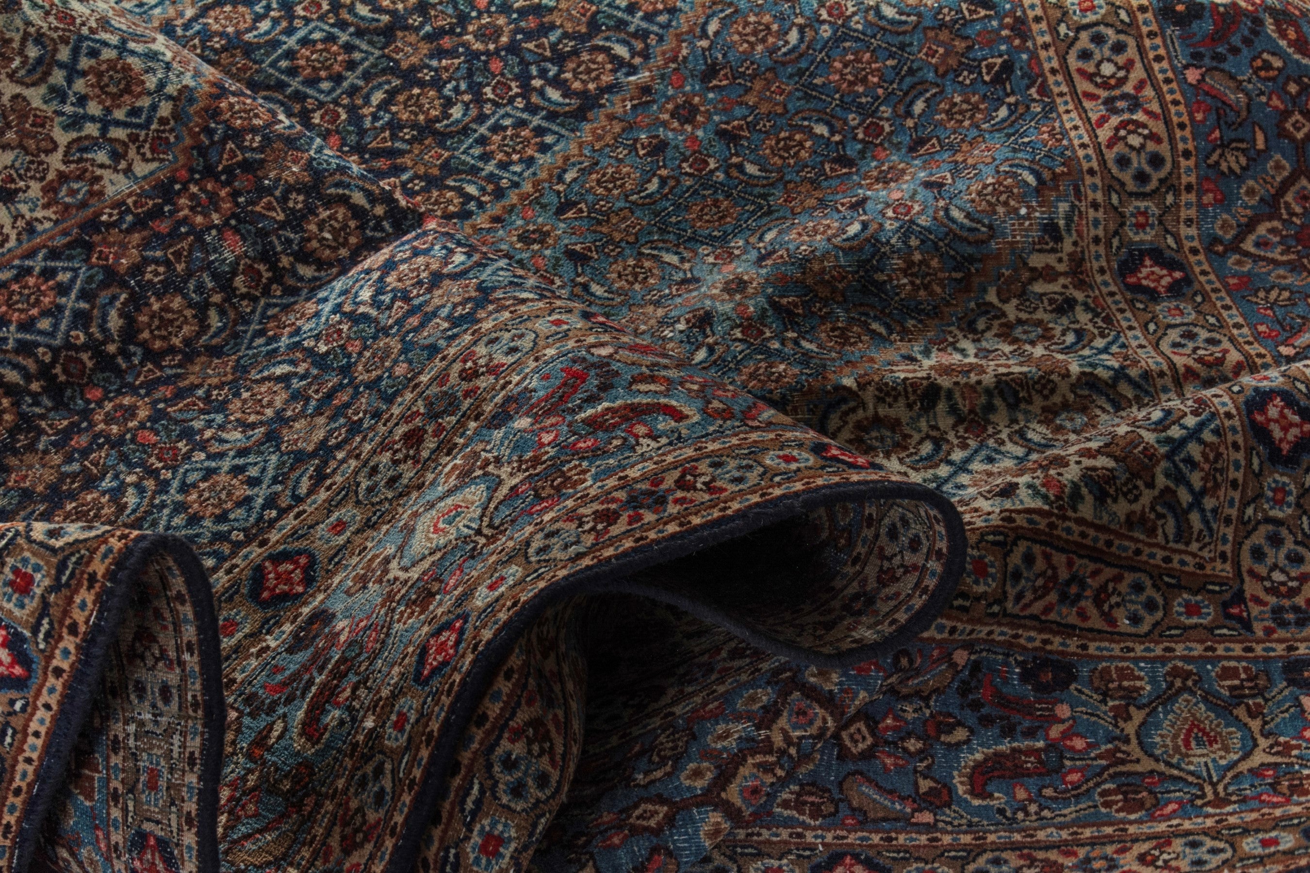 Persian Birjand oversized rug in dark blue and cream, view 20 of 21