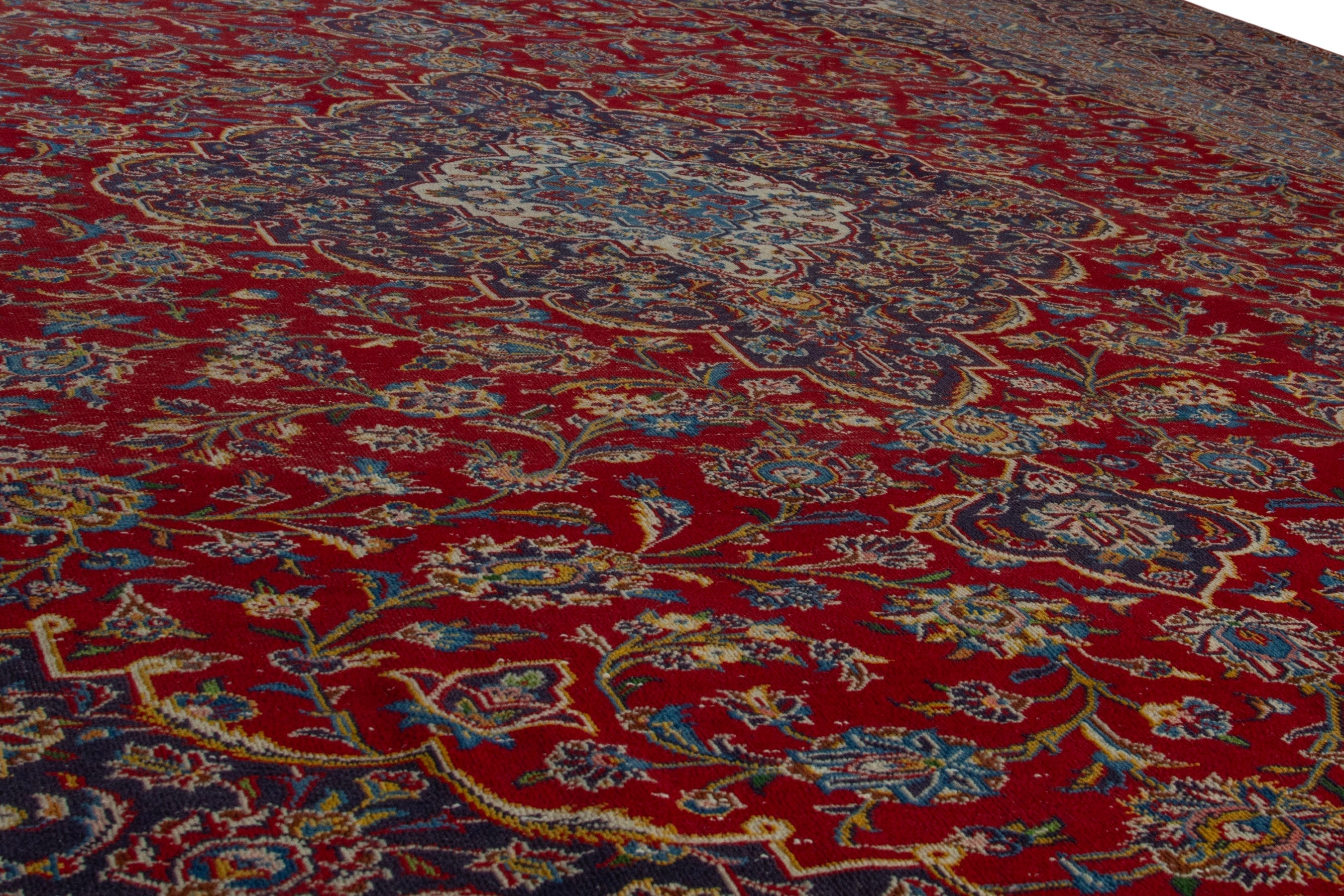 Persian Kashan oversized rug in deep red and dark brown, view 10 of 20