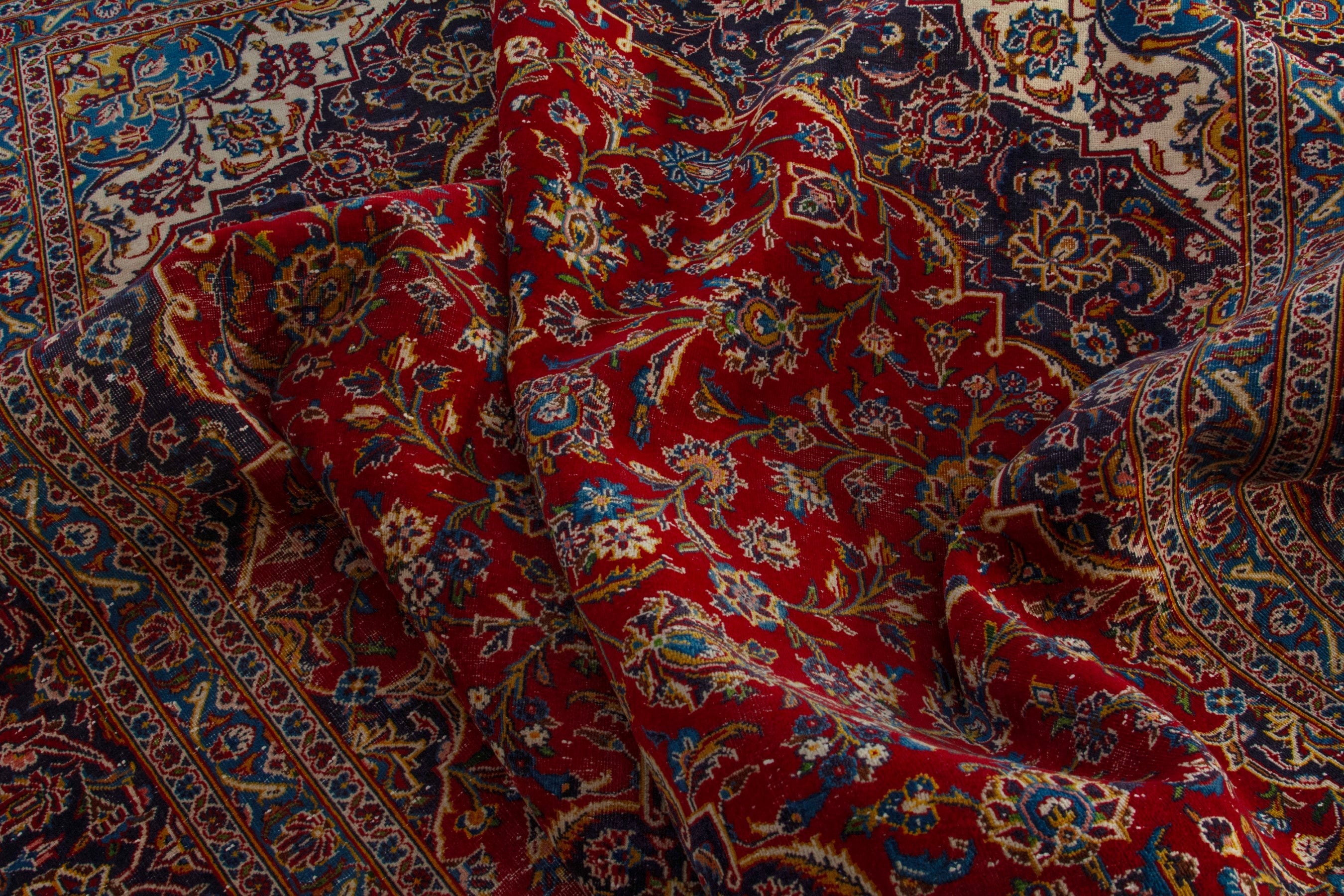 Persian Kashan oversized rug in deep red and dark brown, view 17 of 20