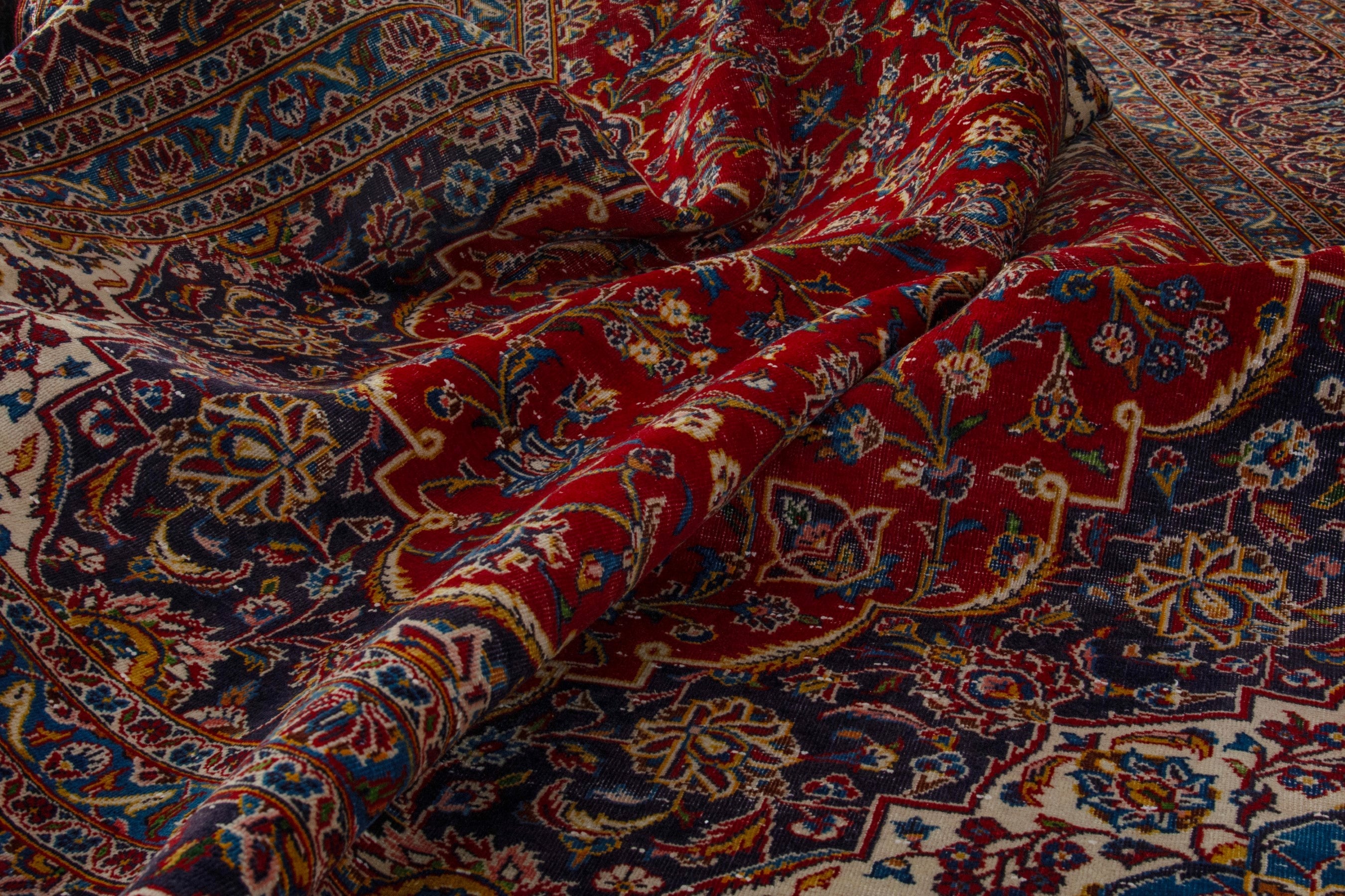 Persian Kashan oversized rug in deep red and dark brown, view 18 of 20