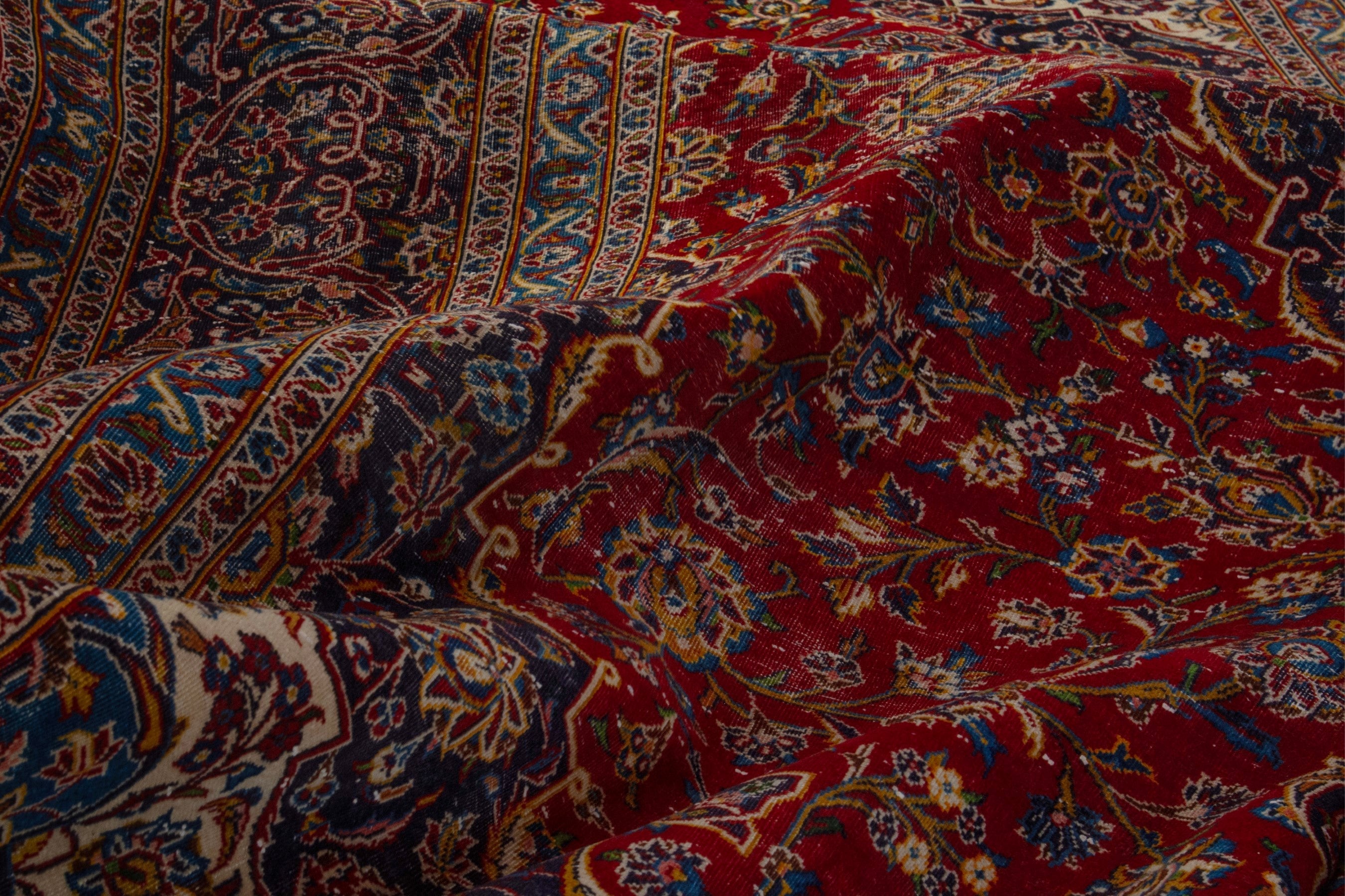 Persian Kashan oversized rug in deep red and dark brown, view 19 of 20