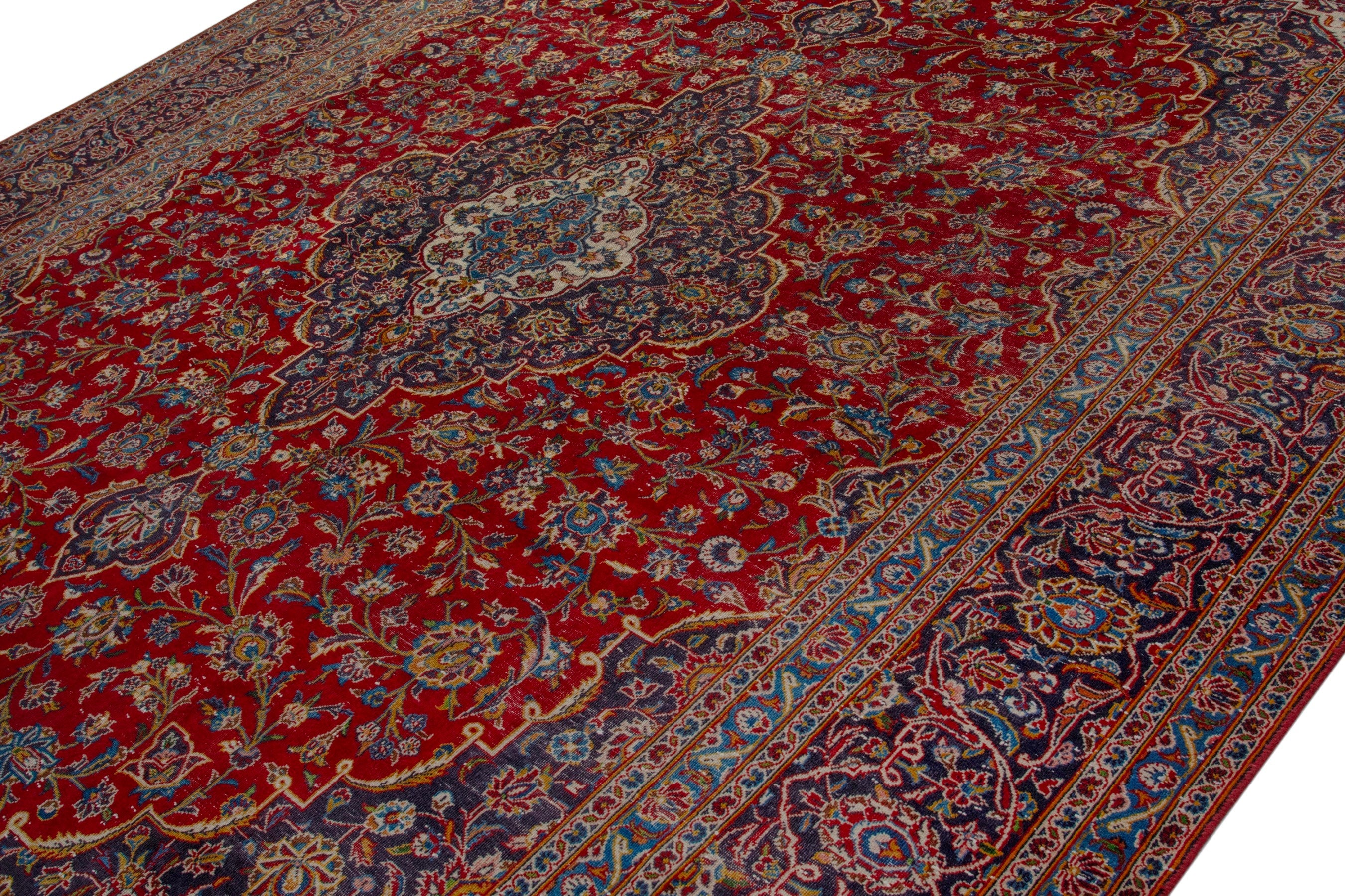 Persian Kashan oversized rug in deep red and dark brown, view 4 of 20