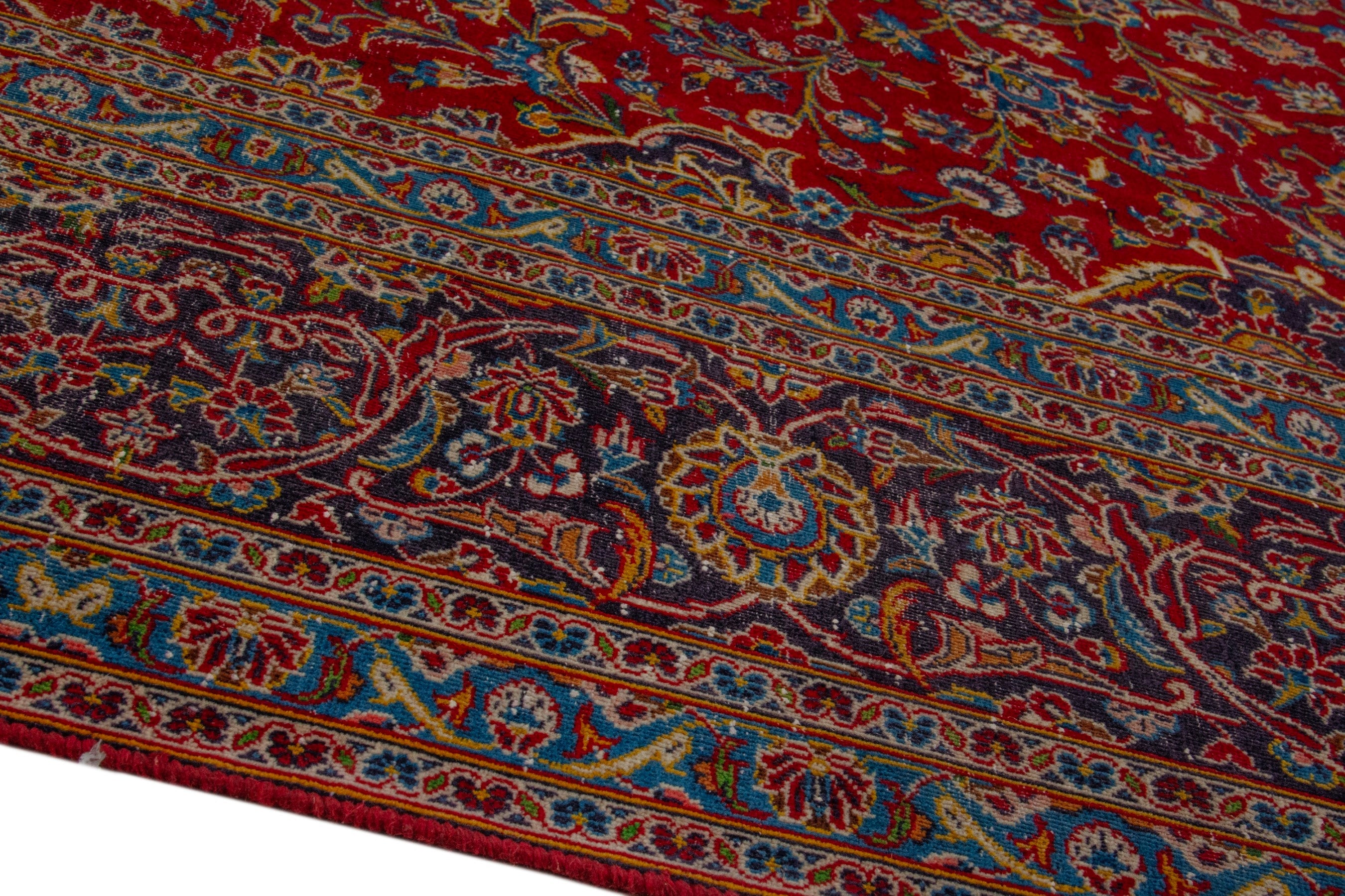 Persian Kashan oversized rug in deep red and dark brown, view 8 of 20