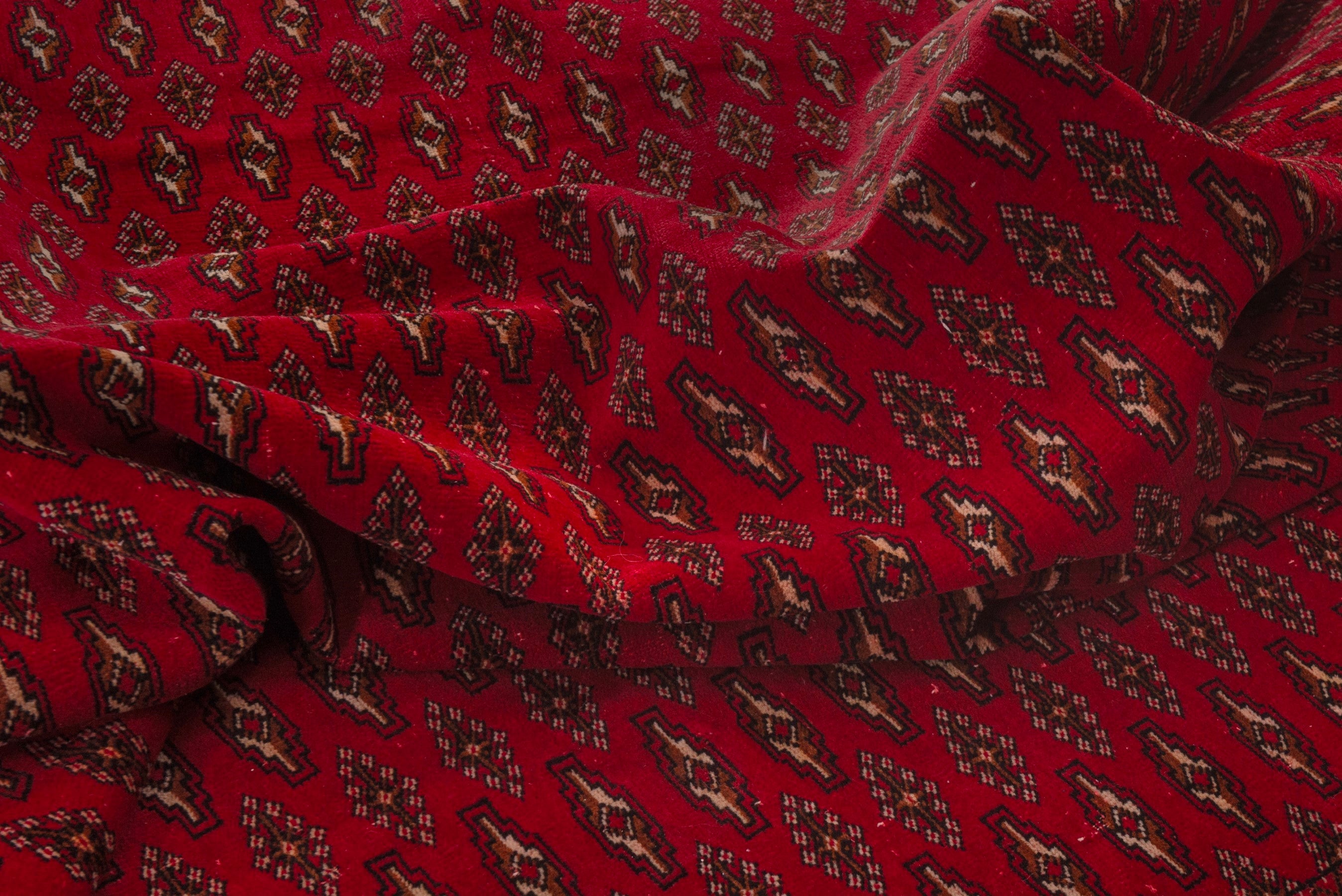Persian Torkaman oversized rug in burgundy and deep red, view 18 of 20