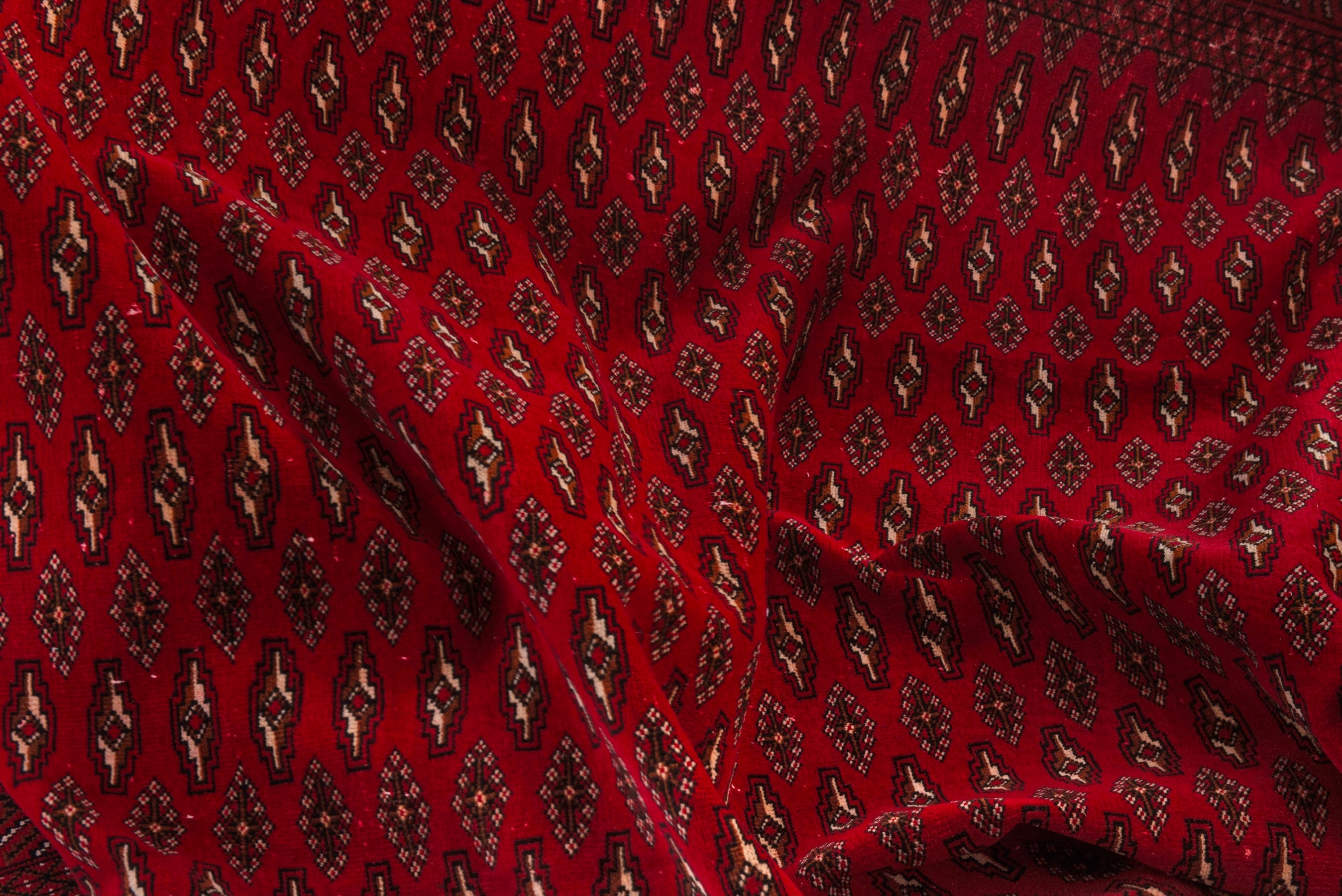 Persian Torkaman oversized rug in burgundy and deep red, view 19 of 20