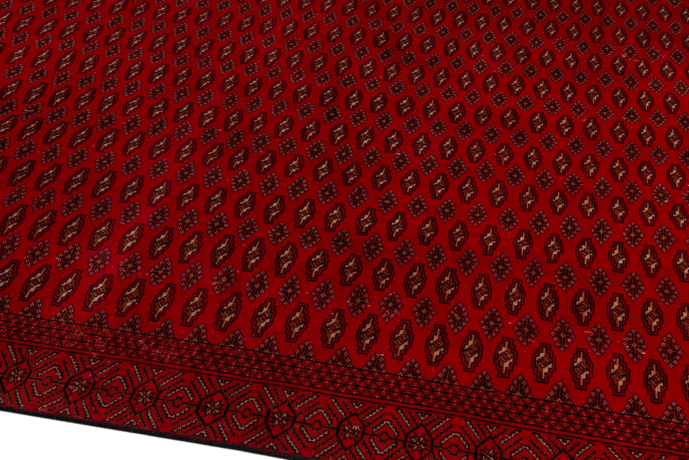 Persian Torkaman oversized rug in burgundy and deep red, view 8 of 20