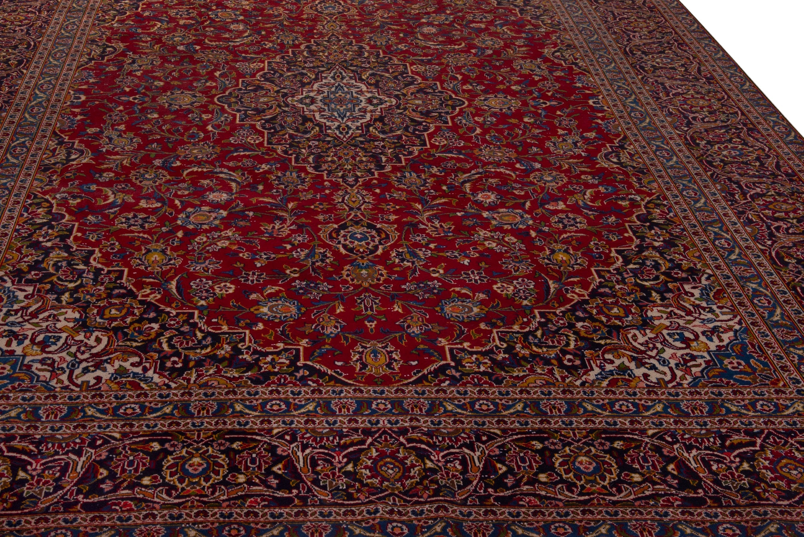 Persian Kashan oversized rug in deep red and burgundy, view 10 of 19