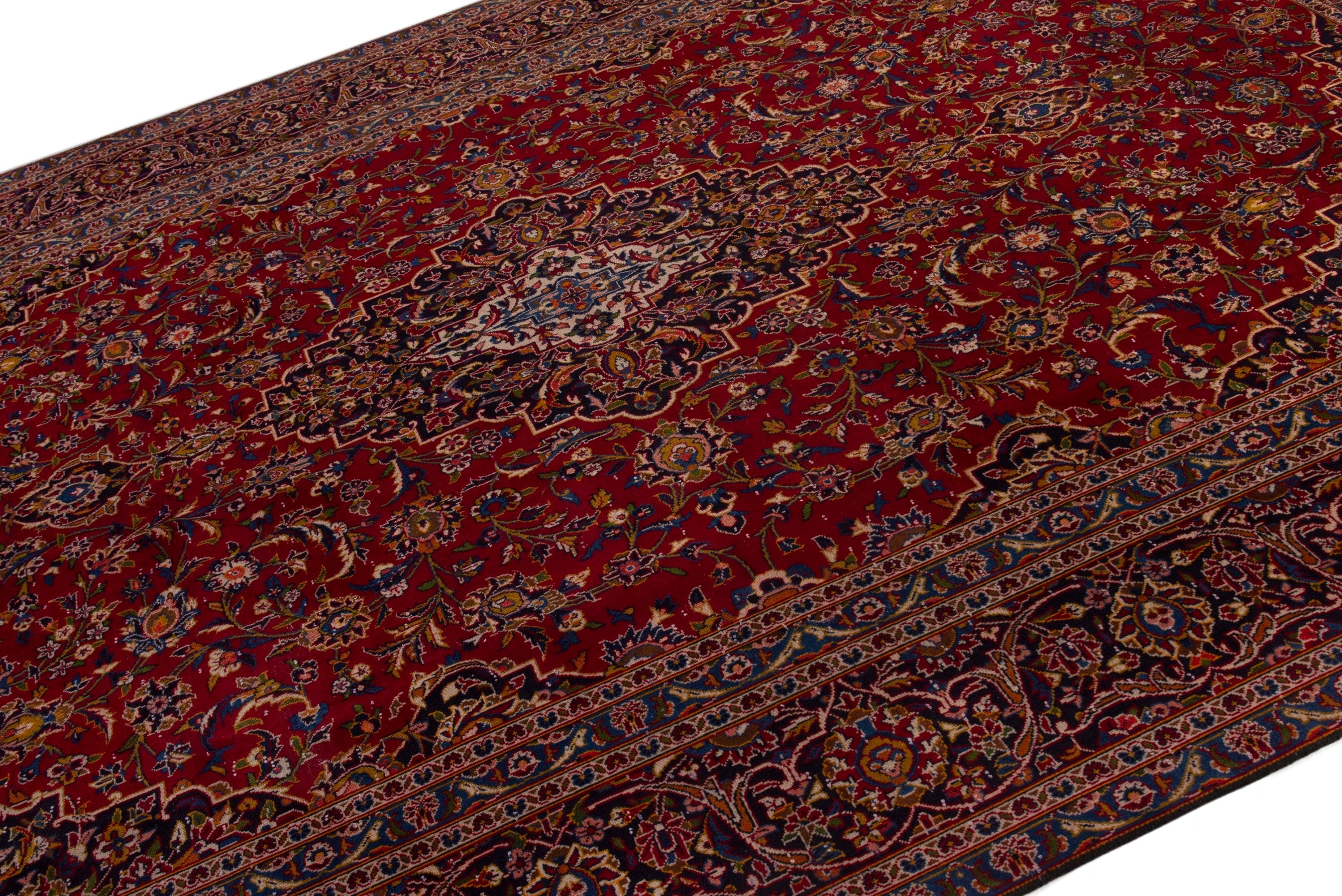 Persian Kashan oversized rug in deep red and burgundy, view 4 of 19