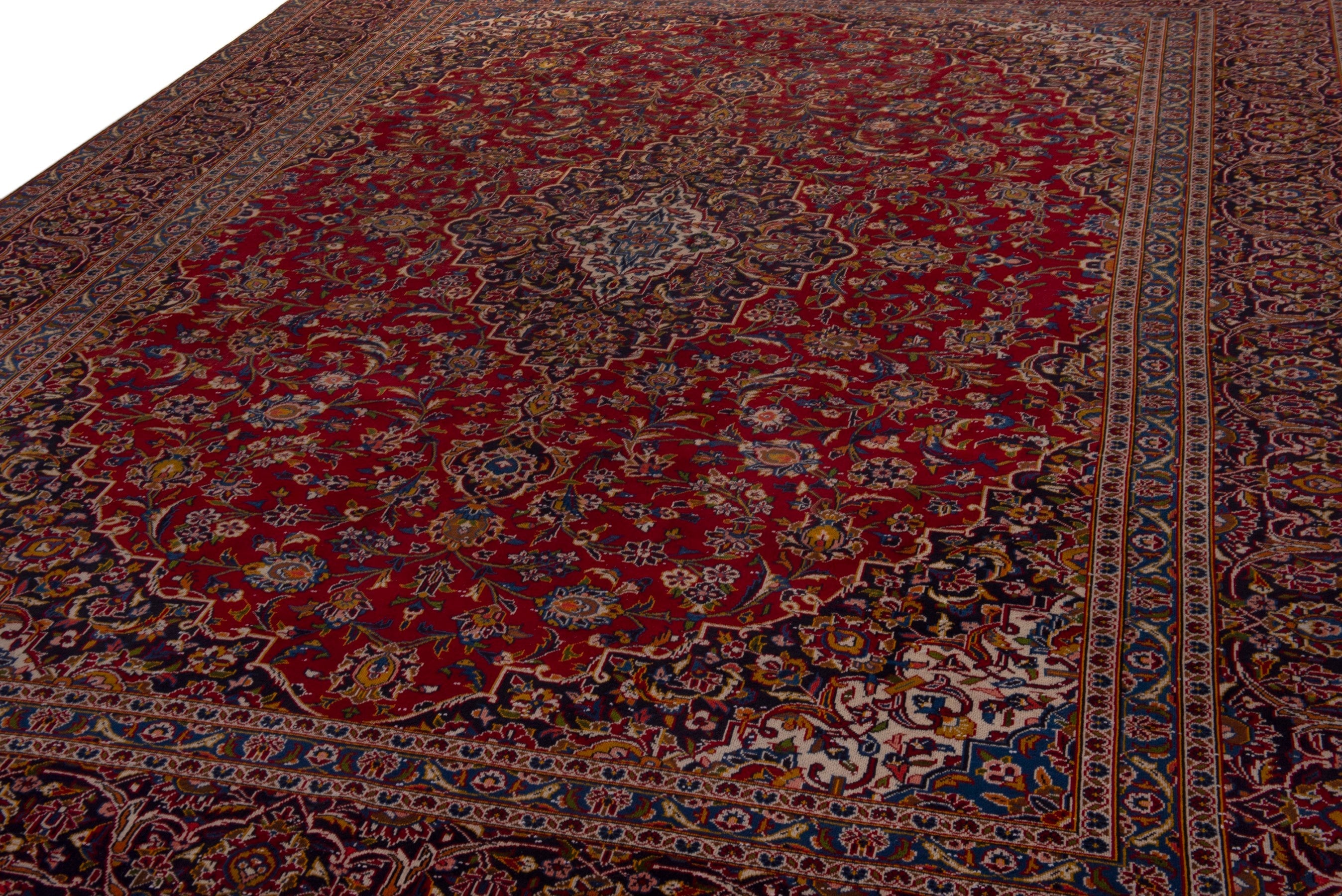 Persian Kashan oversized rug in deep red and burgundy, view 9 of 19
