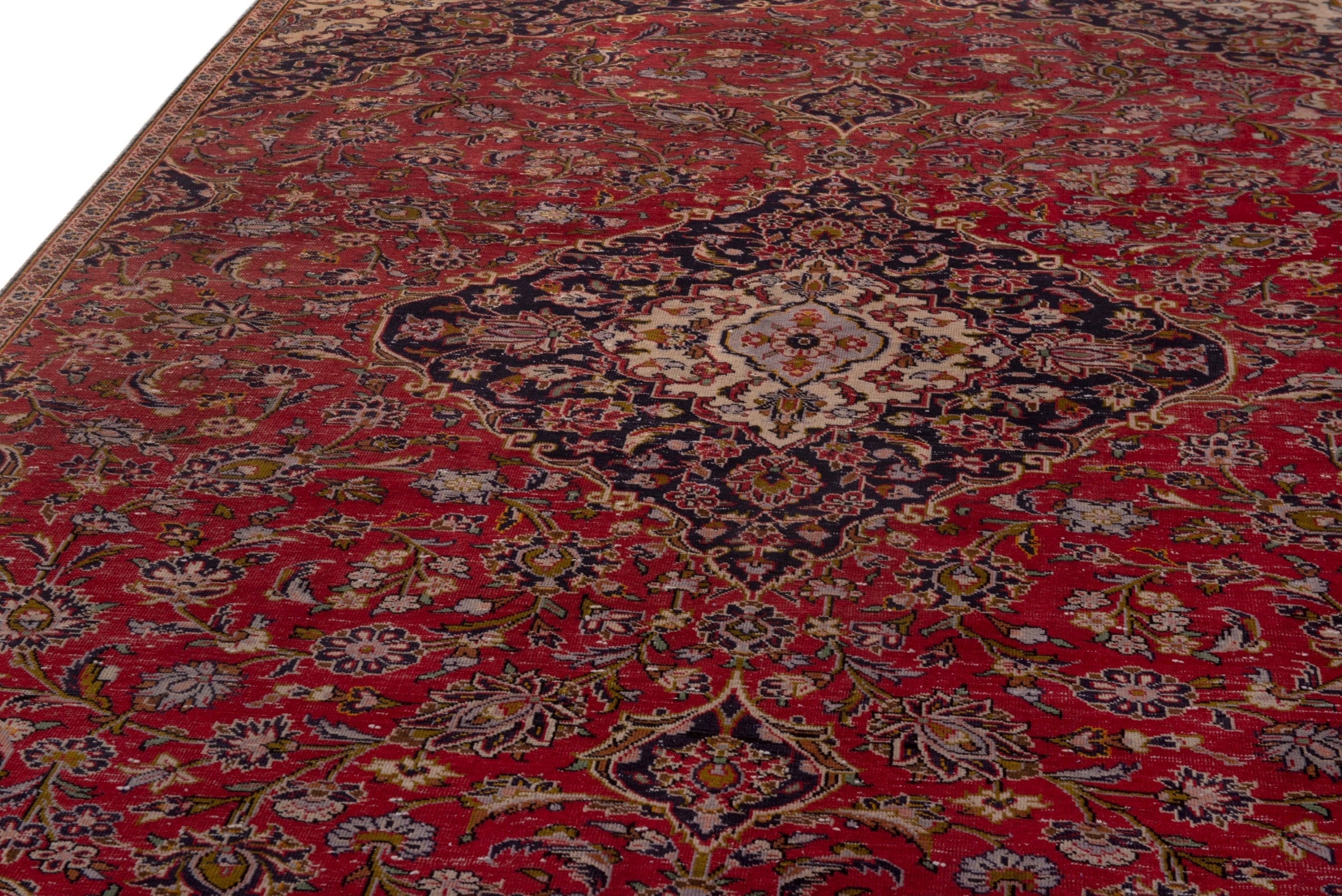 Persian Kashan area rug in deep red and navy, view 9 of 18