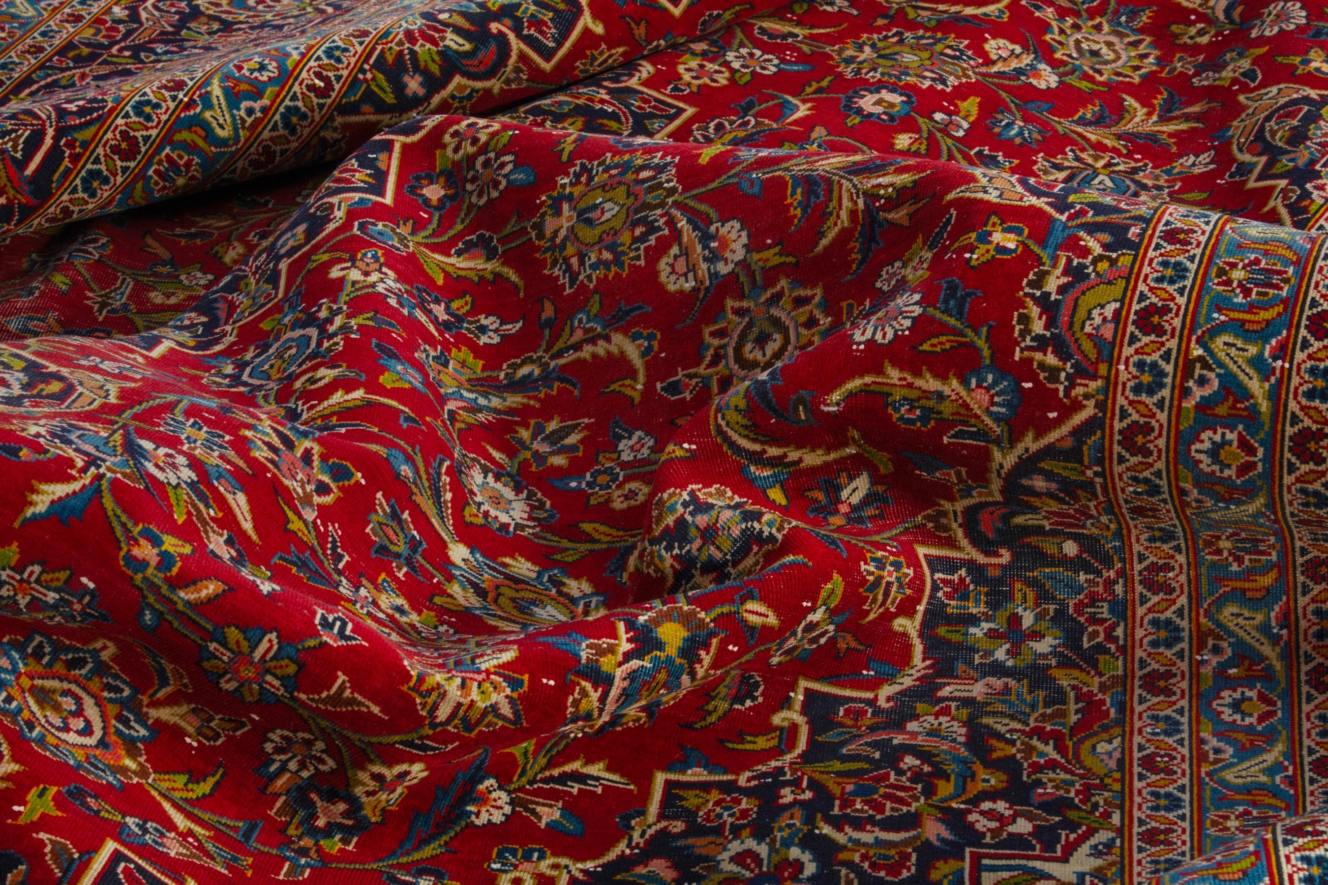 Persian Kashan oversized rug in deep red and brown, view 17 of 22