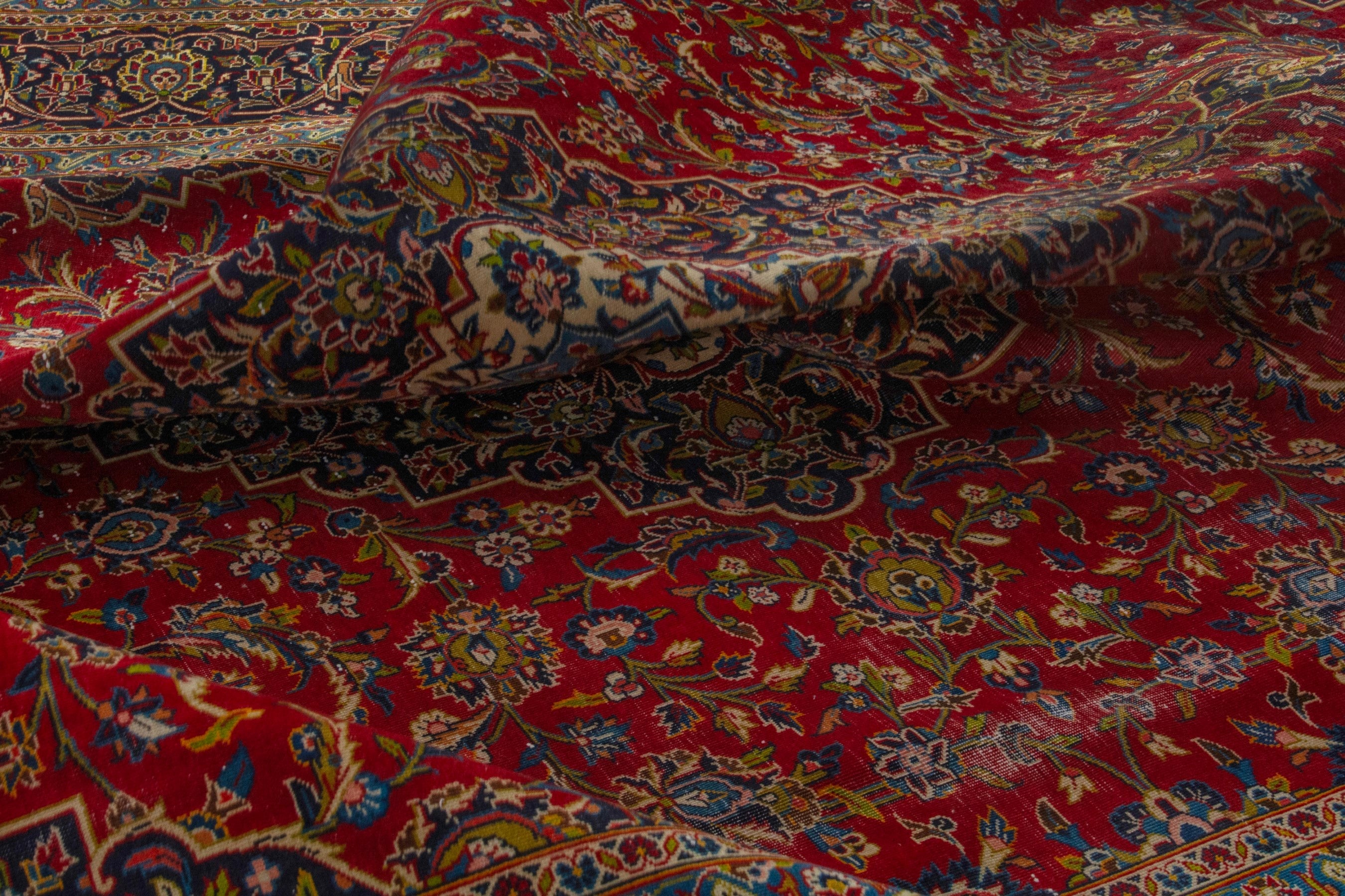 Persian Kashan oversized rug in deep red and brown, view 20 of 22
