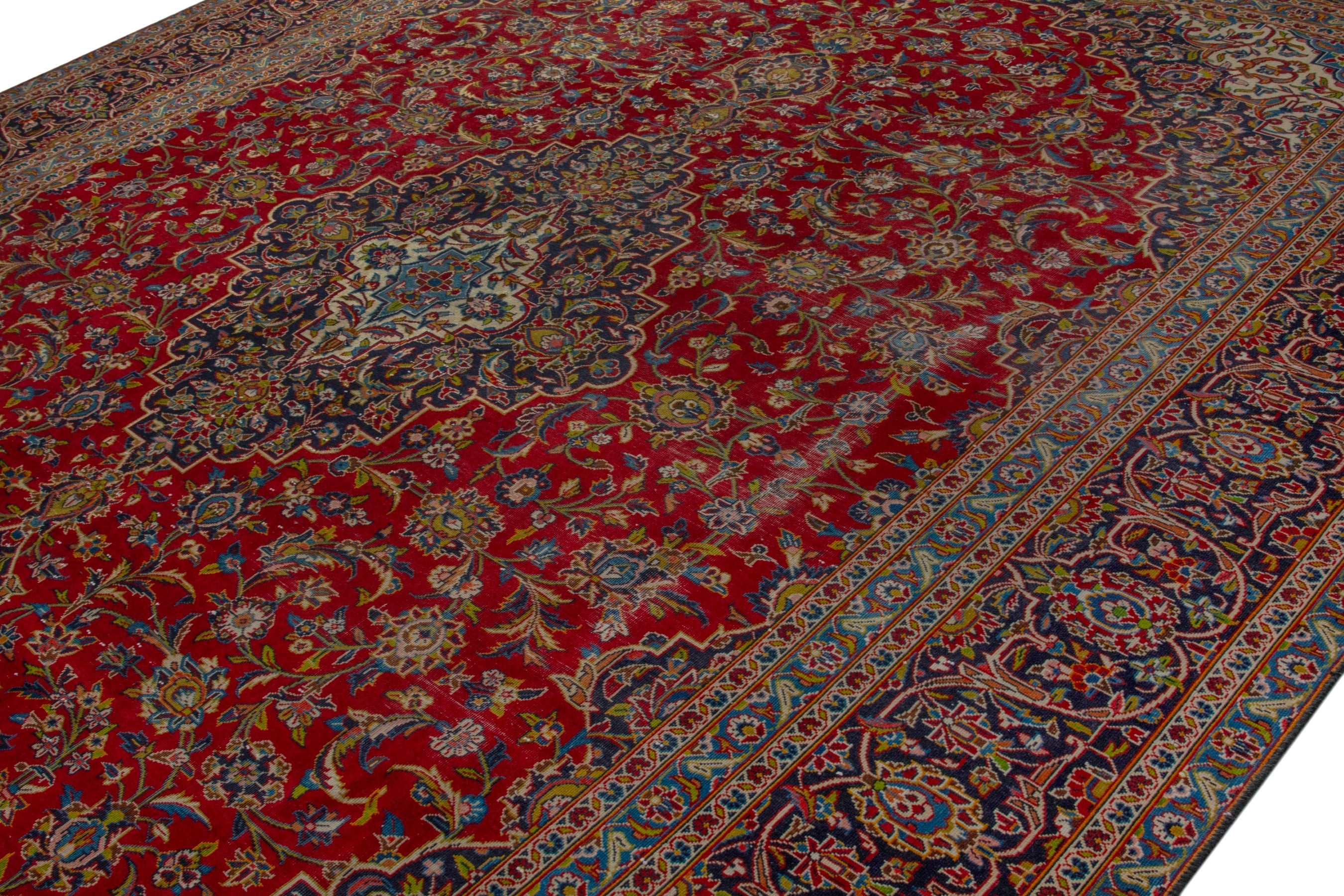 Persian Kashan oversized rug in deep red and brown, view 4 of 22