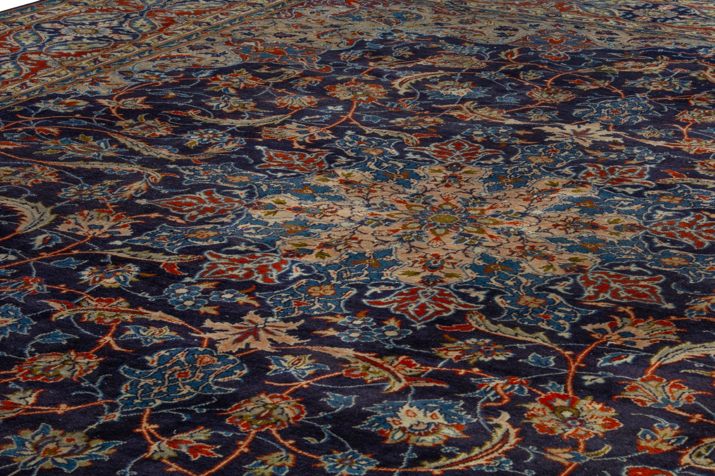 Persian Kashmar oversized rug in navy and terracotta, view 9 of 19