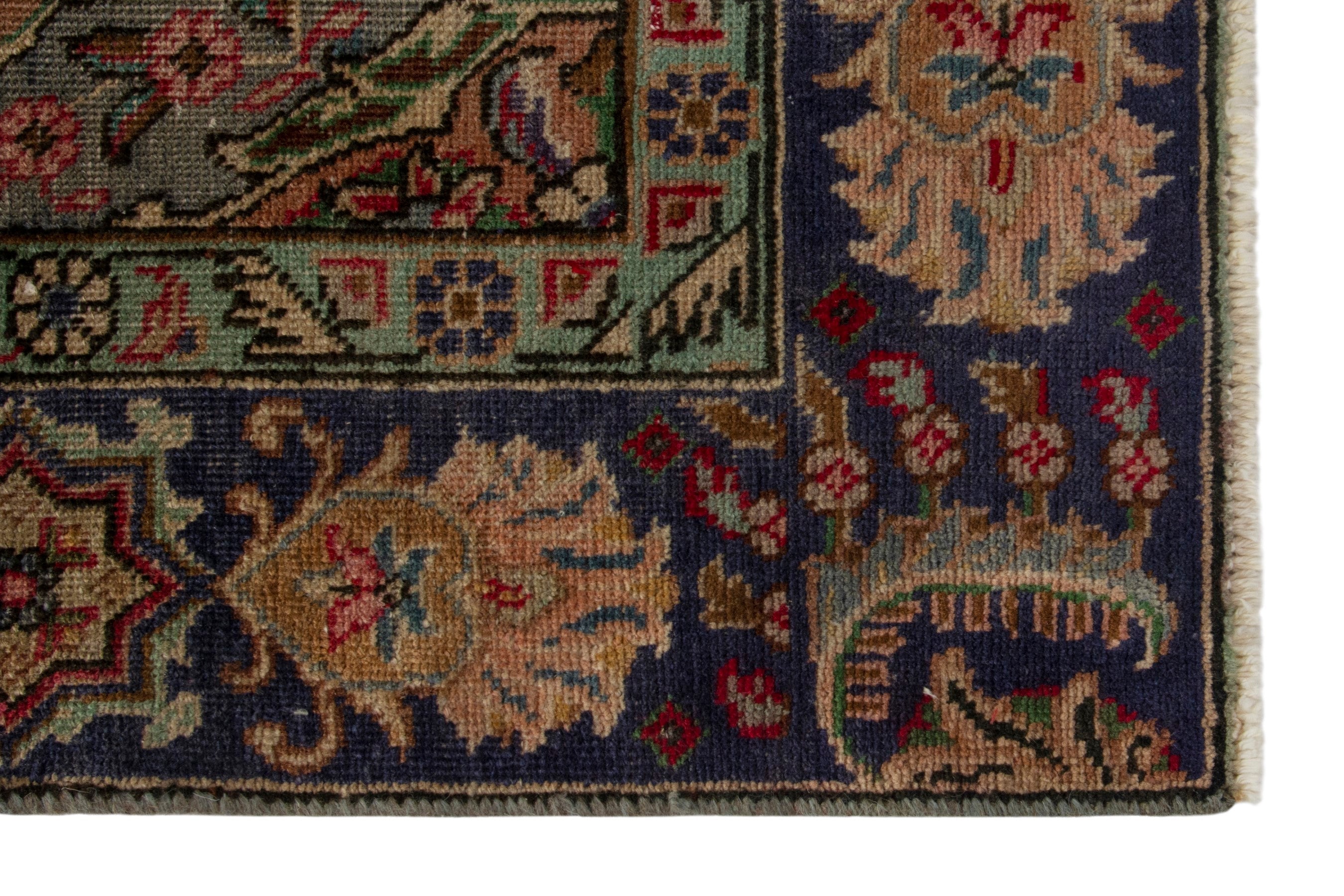 Persian Tabriz area rug in deep red and navy, view 5 of 19