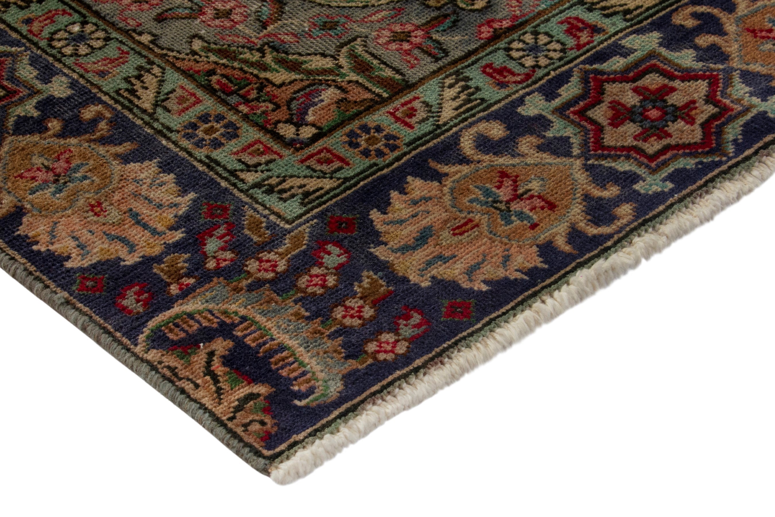 Persian Tabriz area rug in deep red and navy, view 6 of 19