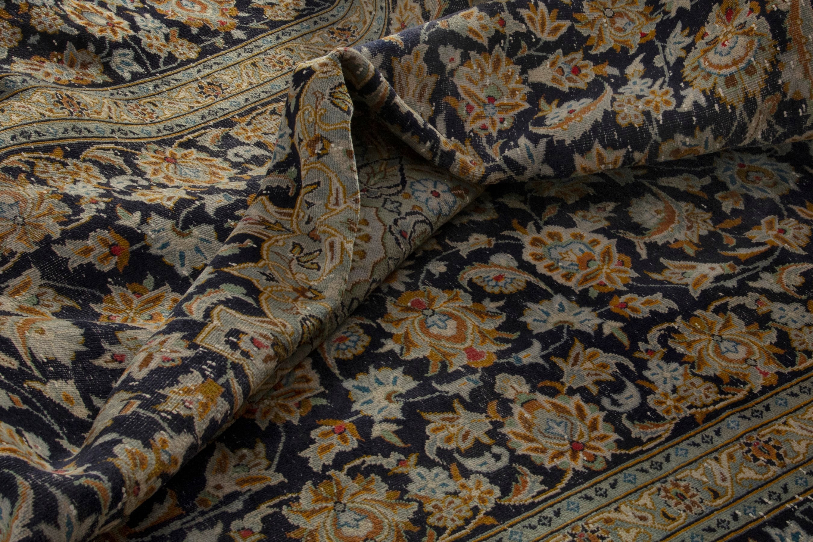 Persian Kashan oversized rug in navy and gold, view 17 of 21