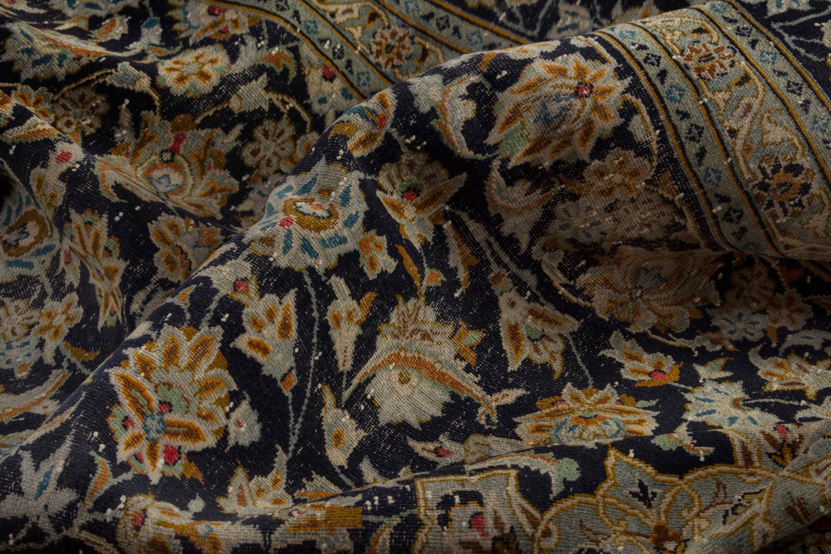 Persian Kashan oversized rug in navy and gold, view 18 of 21