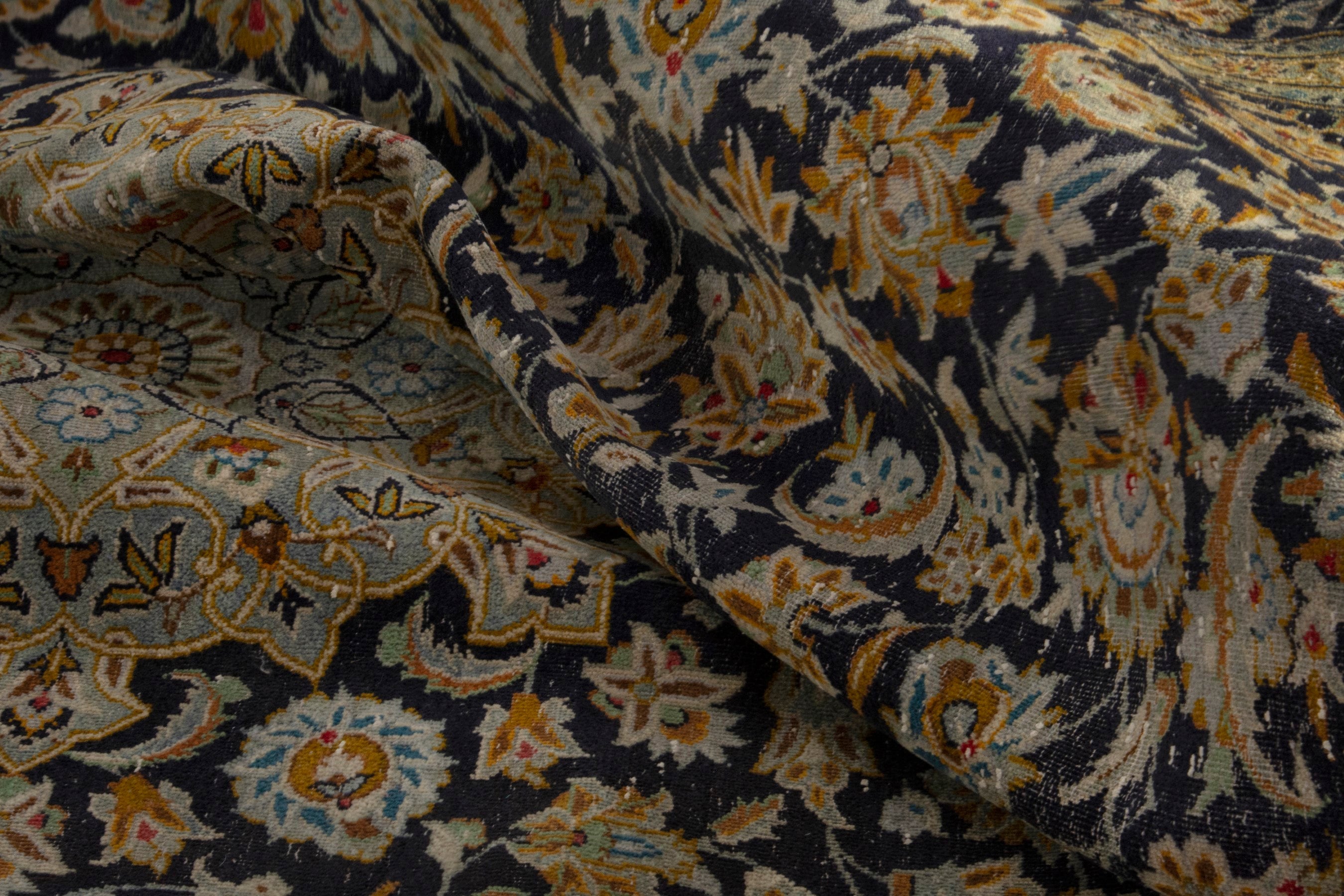 Persian Kashan oversized rug in navy and gold, view 19 of 21