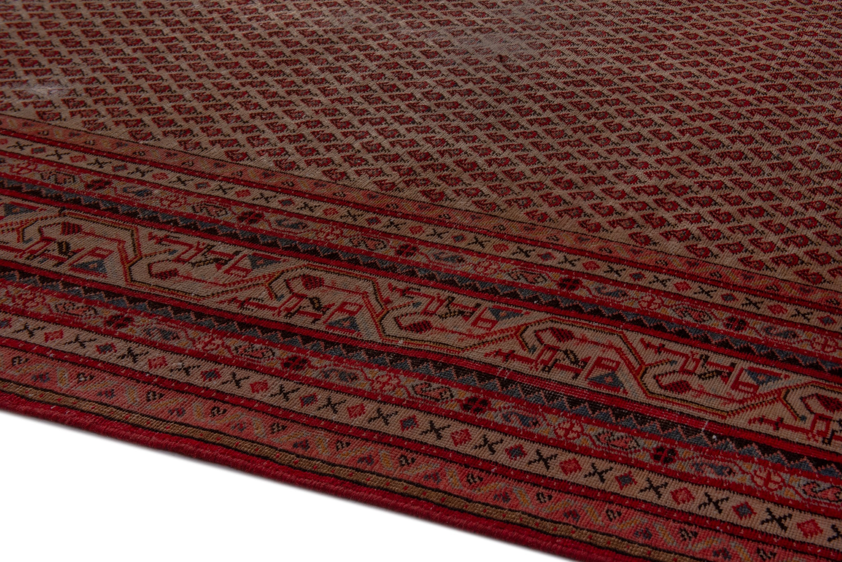 Persian Botteh oversized rug in rust and burgundy, view 7 of 19