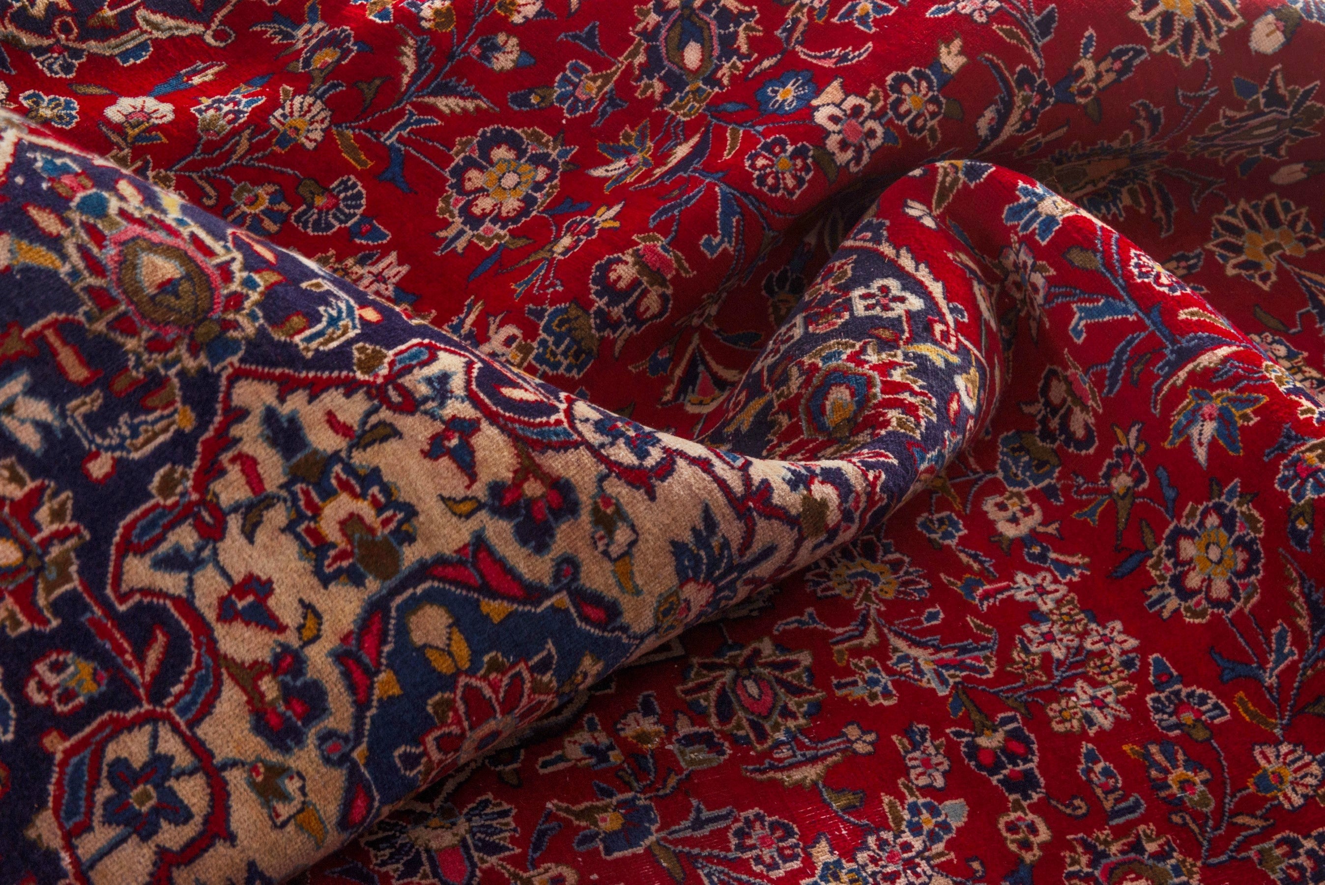 Persian Kashan oversized rug in deep red and dark blue, view 18 of 24