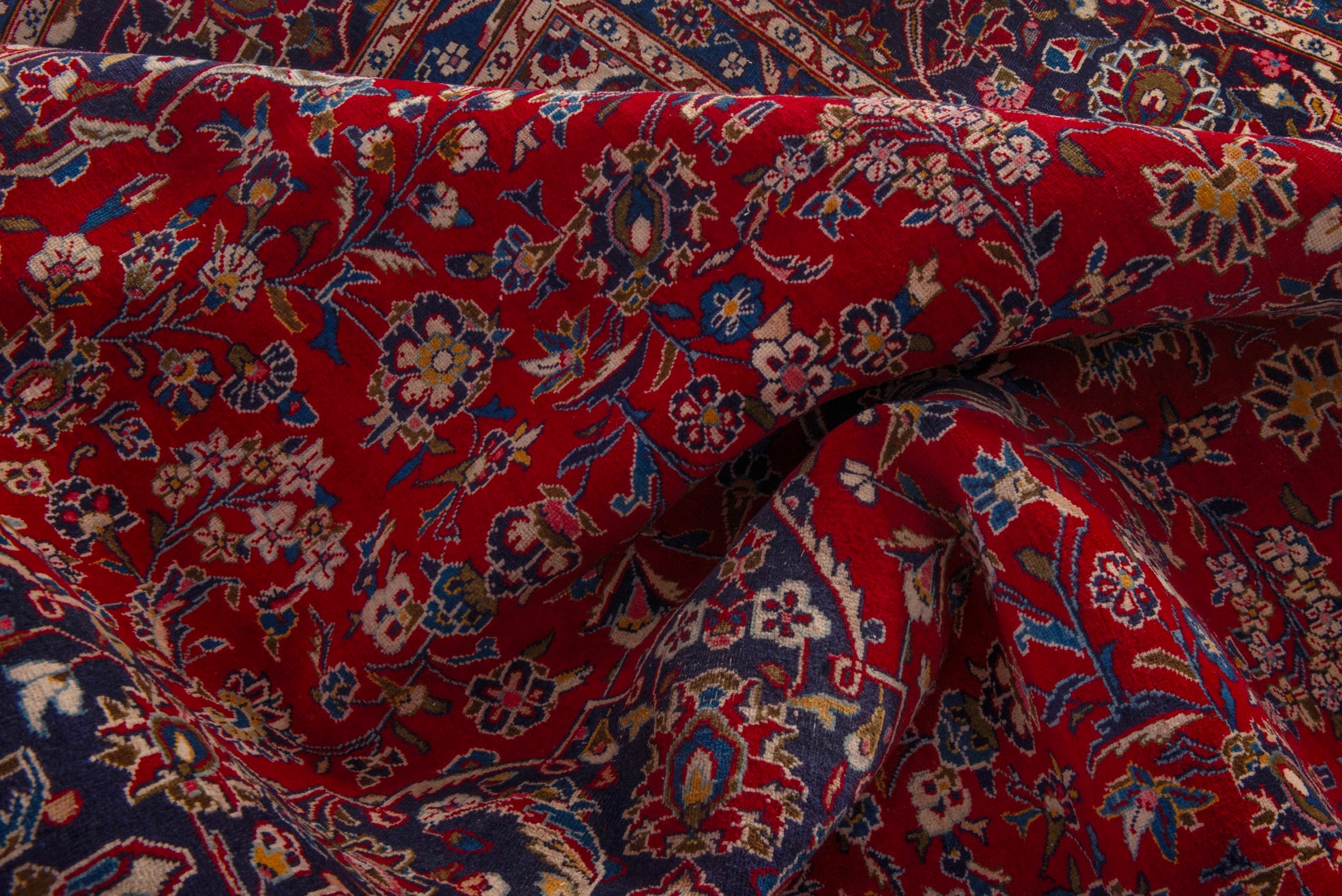 Persian Kashan oversized rug in deep red and dark blue, view 21 of 24