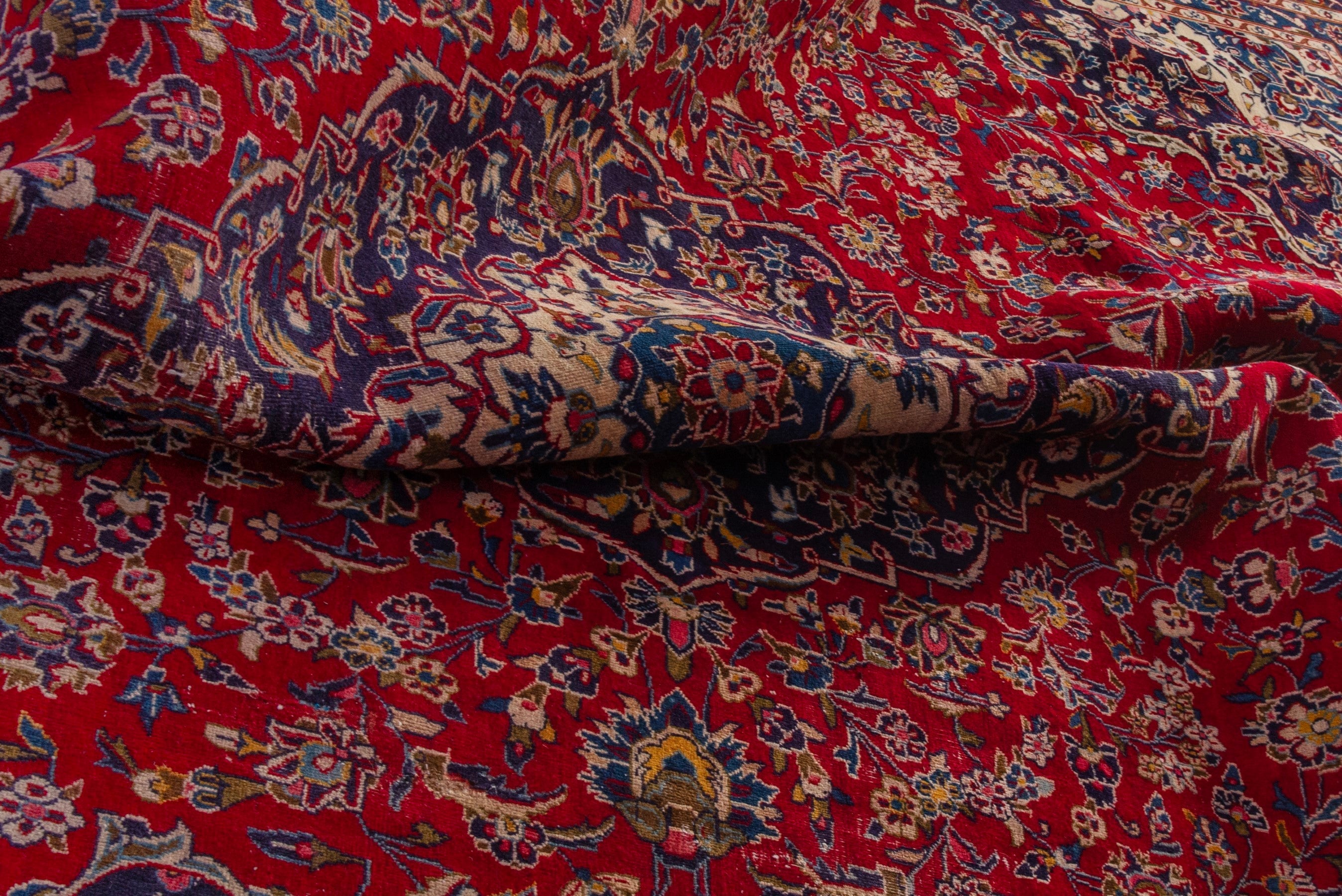 Persian Kashan oversized rug in deep red and dark blue, view 23 of 24
