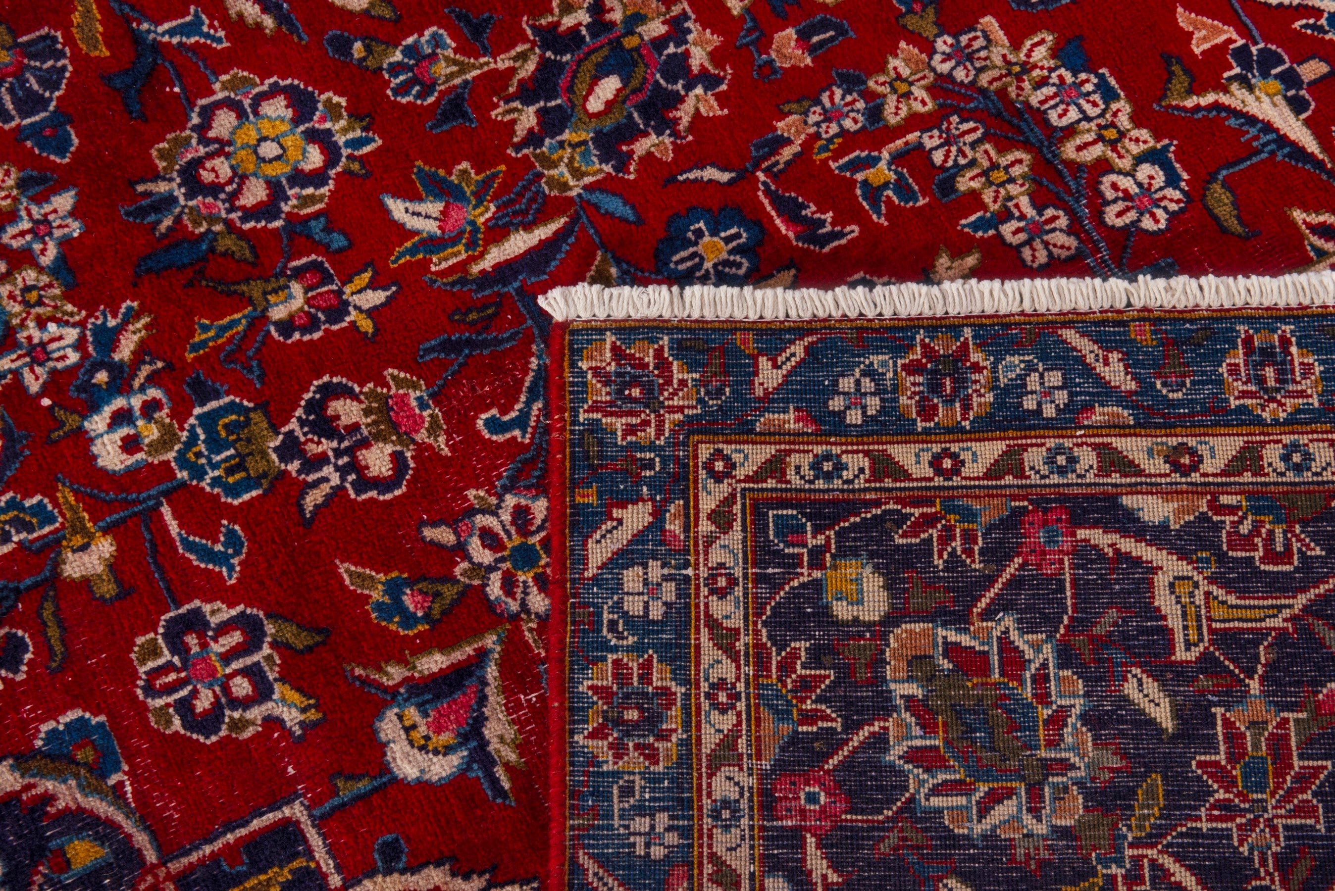 Persian Kashan oversized rug in deep red and dark blue, view 24 of 24