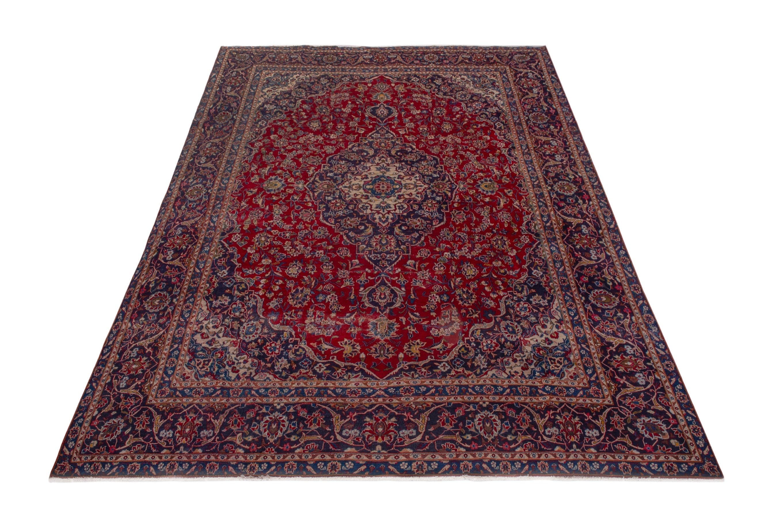 Persian Kashan oversized rug in deep red and dark blue, view 3 of 24