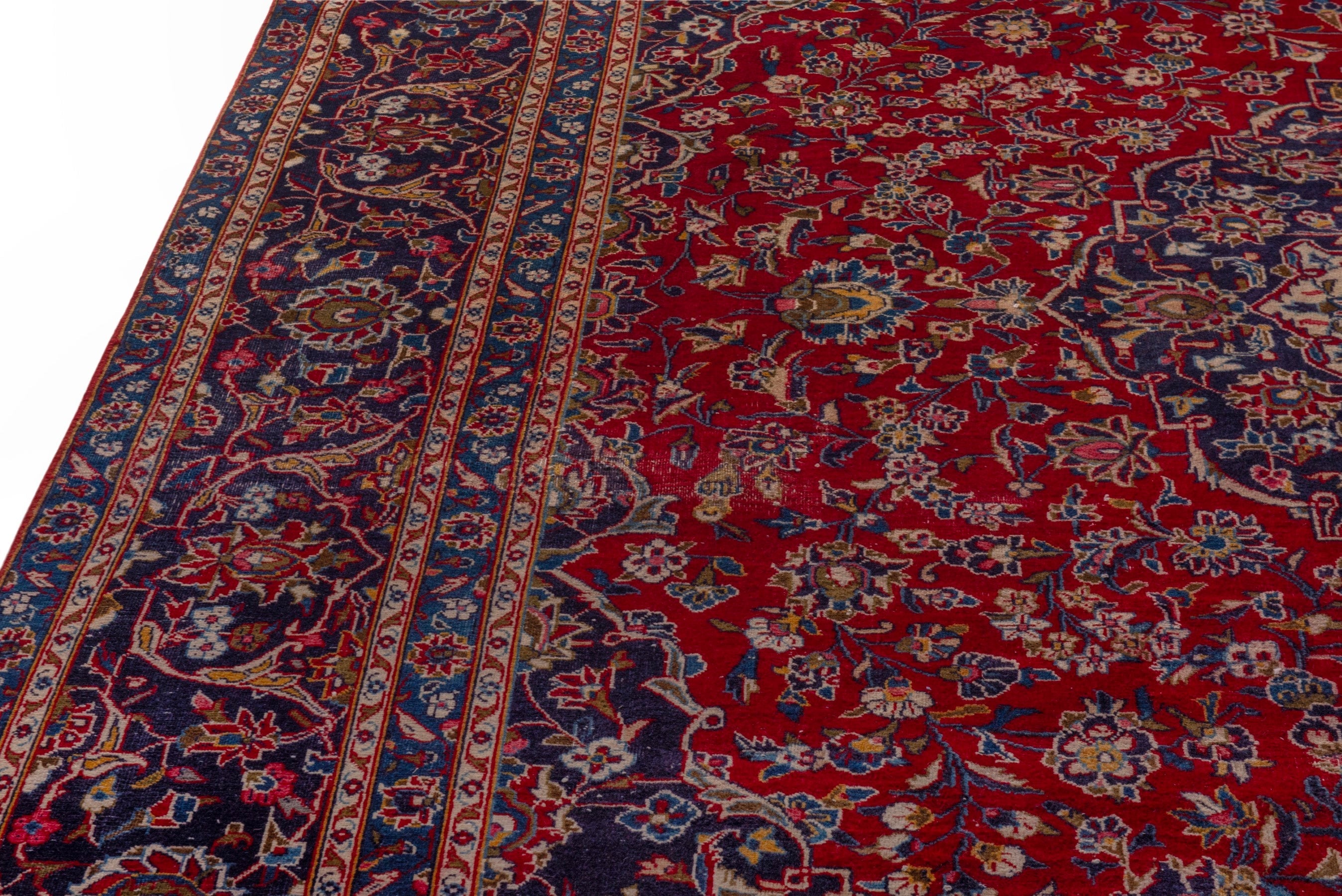 Persian Kashan oversized rug in deep red and dark blue, view 7 of 24