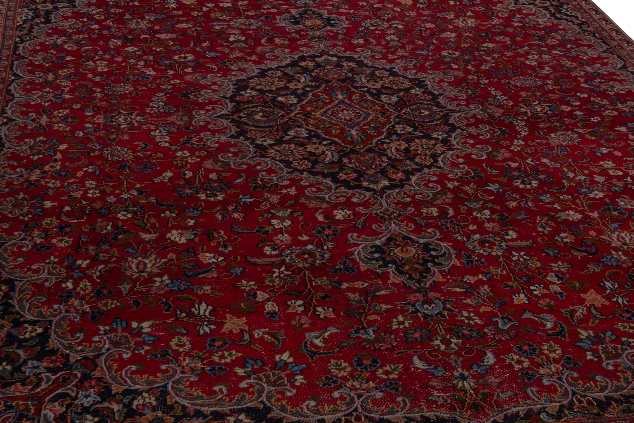 Persian Mashhad oversized rug in deep red and navy, view 10 of 24