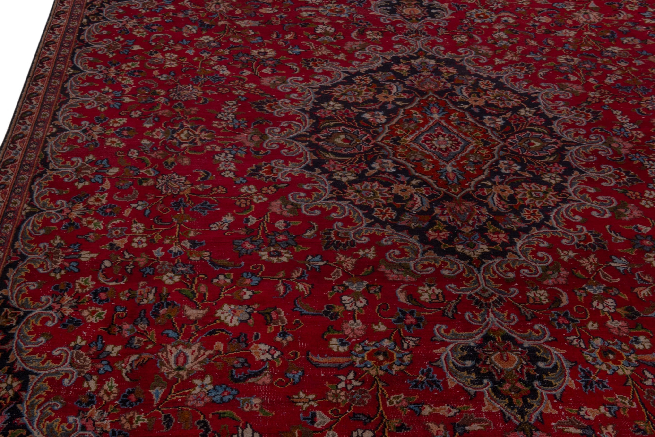 Persian Mashhad oversized rug in deep red and navy, view 7 of 24