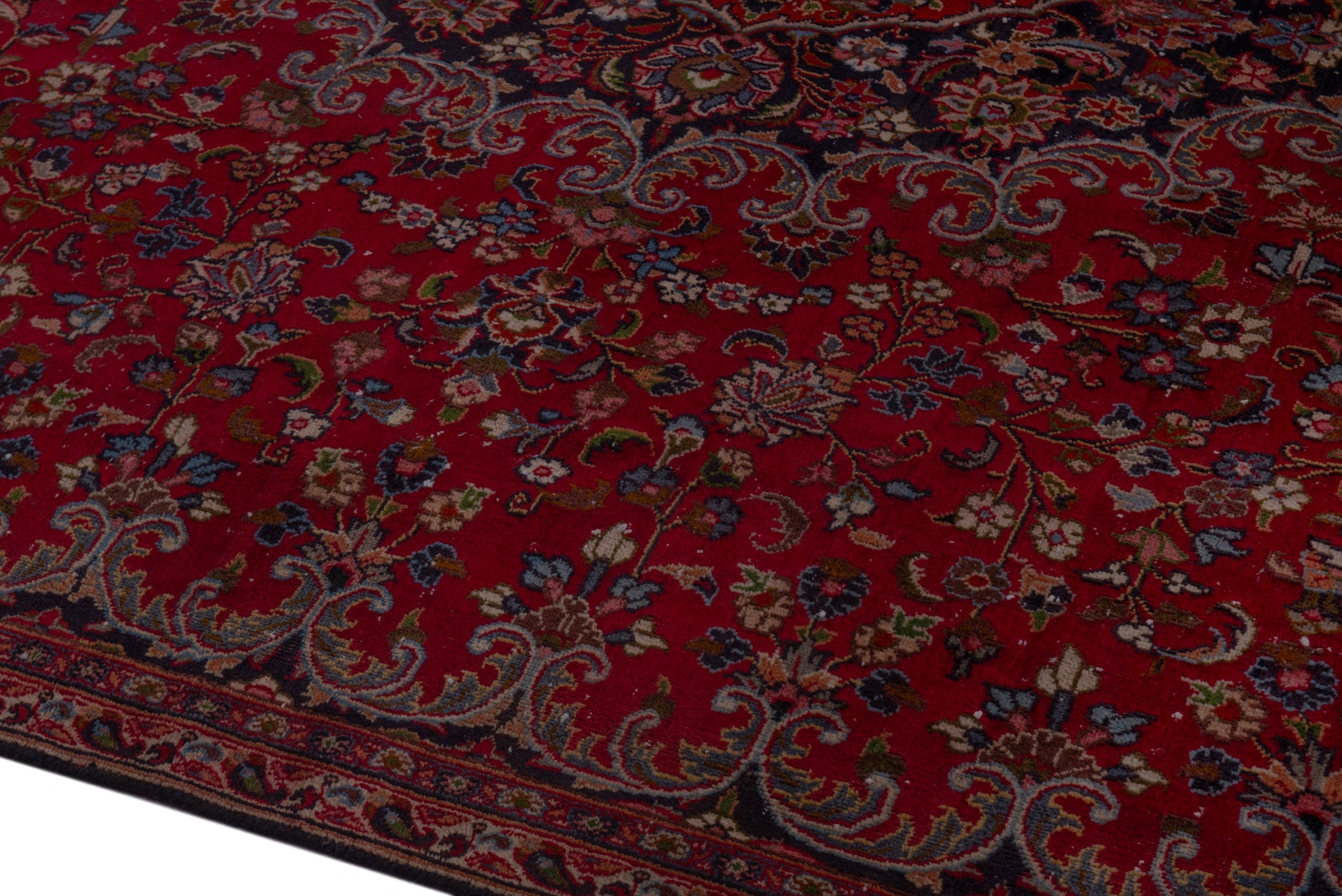 Persian Mashhad oversized rug in deep red and navy, view 8 of 24