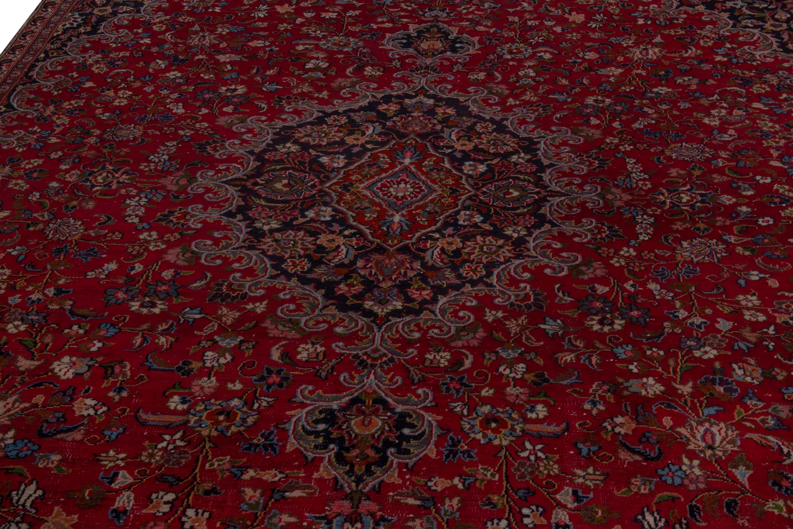 Persian Mashhad oversized rug in deep red and navy, view 9 of 24