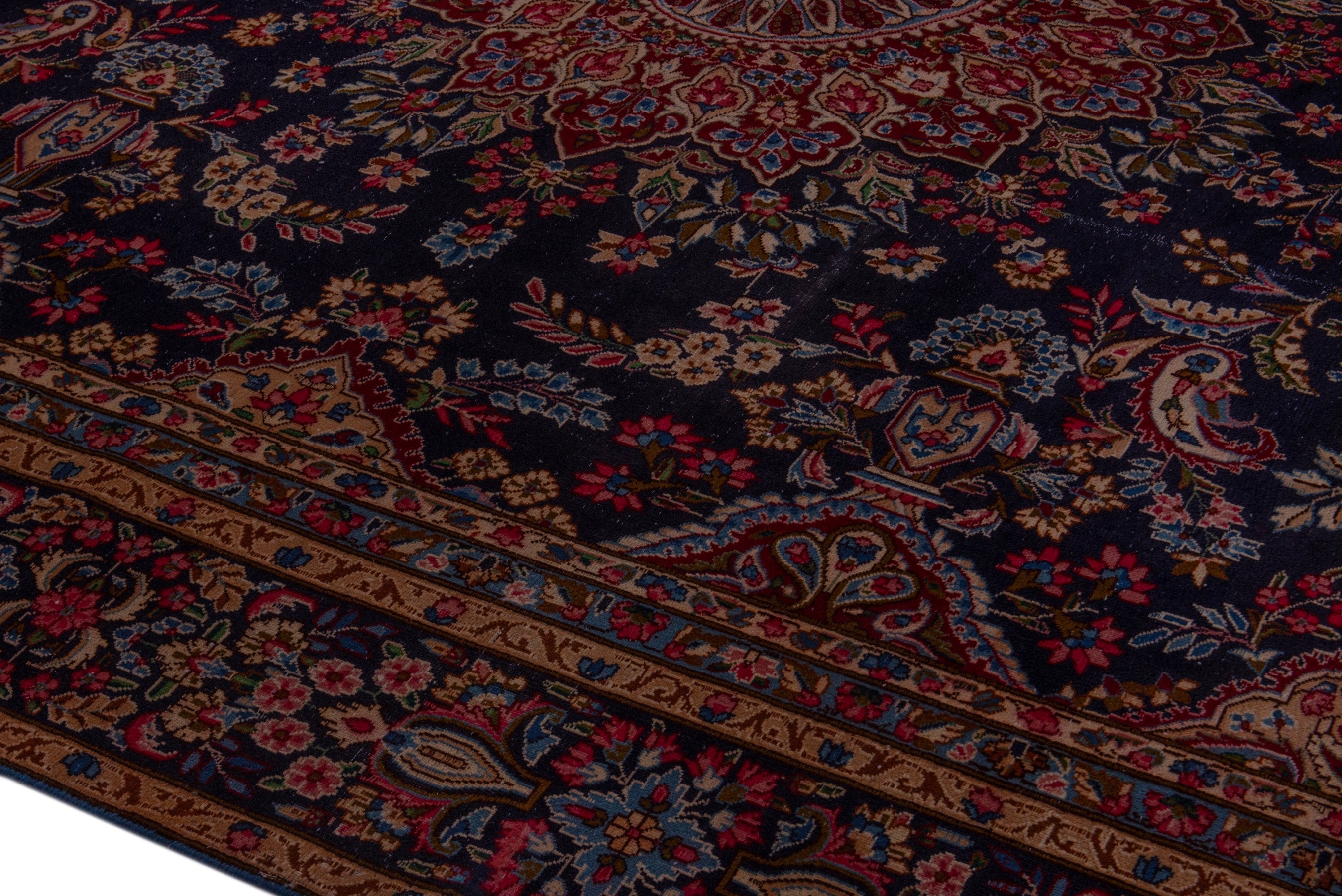 Persian Kerman oversized rug in navy and burgundy, view 8 of 22
