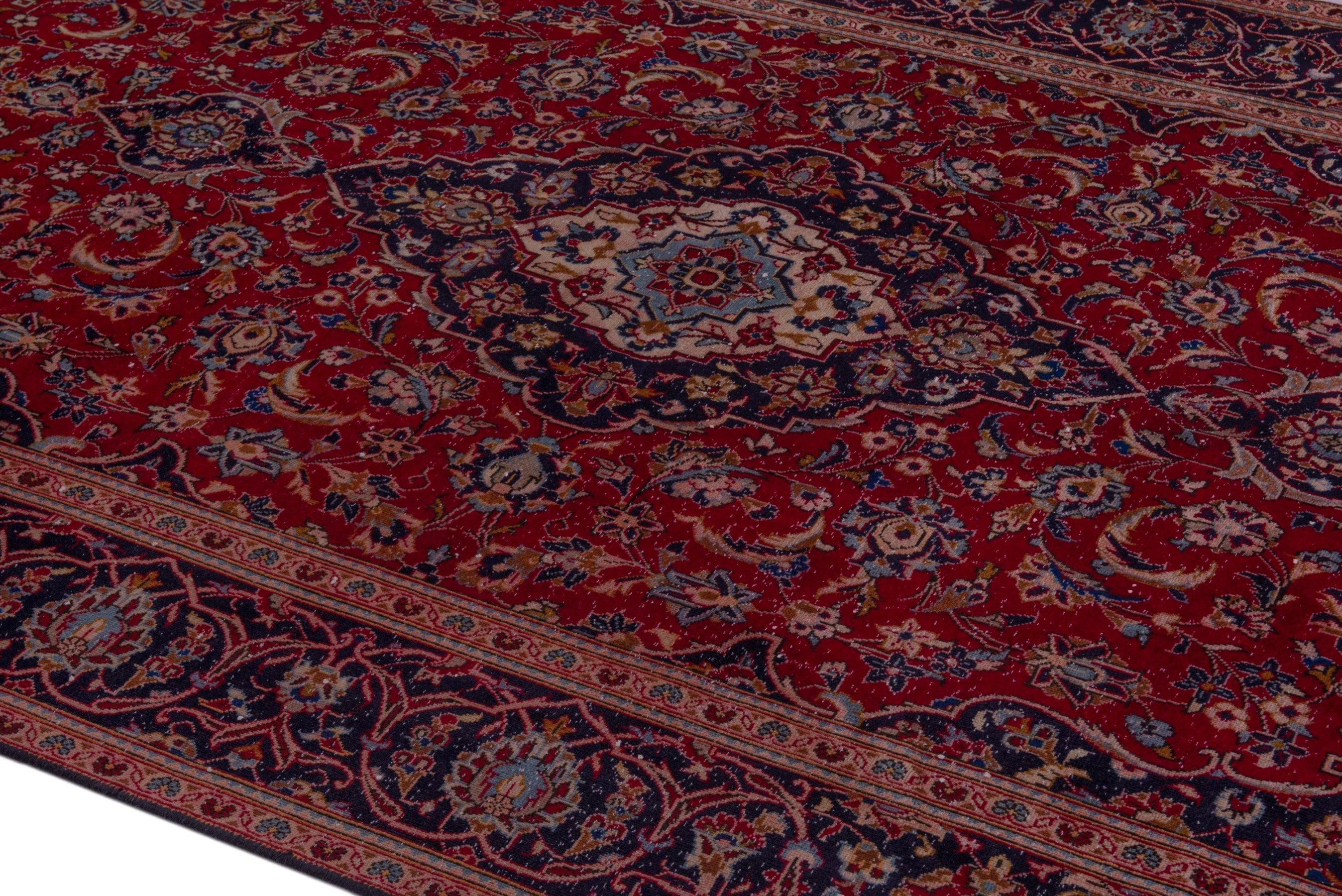 Persian Kashan oversized rug in burgundy and dark blue, view 8 of 20