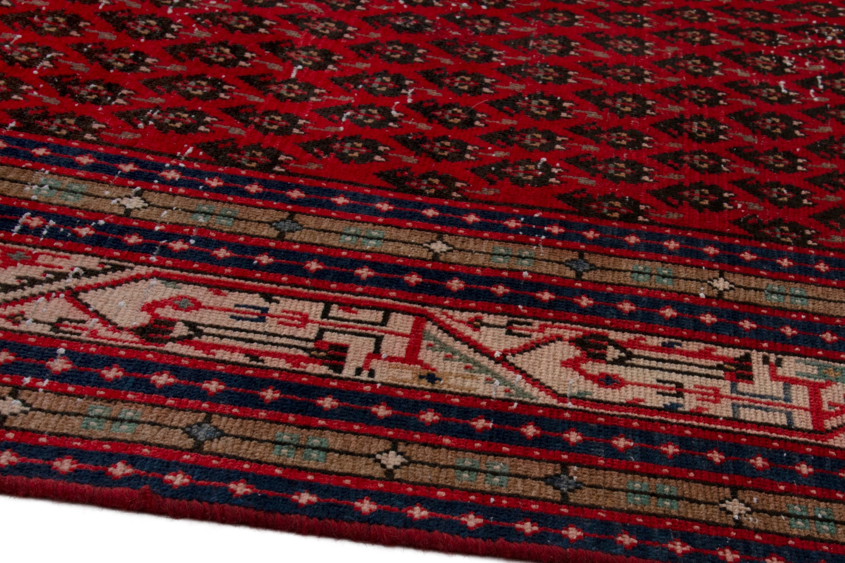 Persian Botteh oversized rug in deep red and cream, view 8 of 17