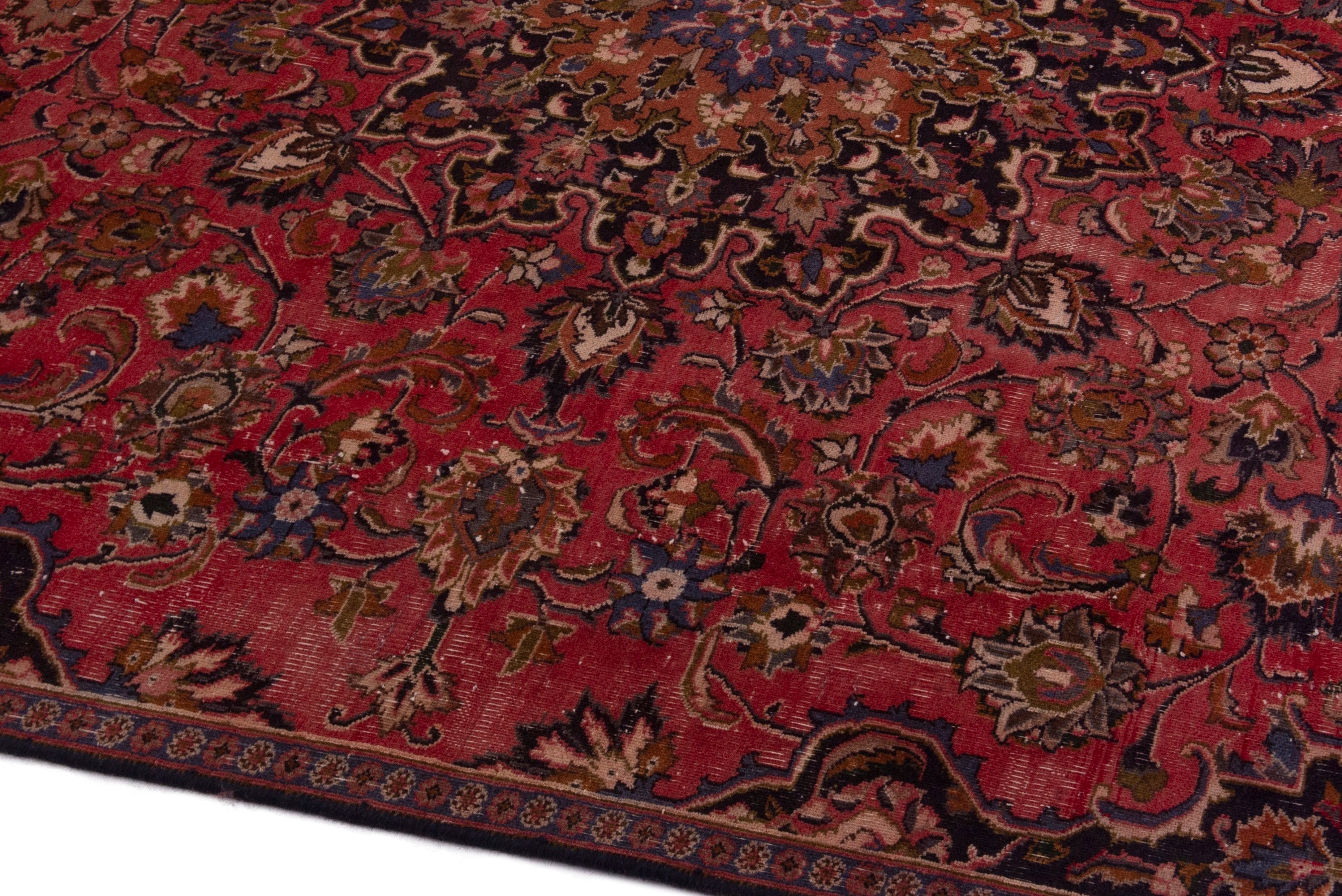 Persian Mashhad area rug in deep red and dark brown, view 8 of 18