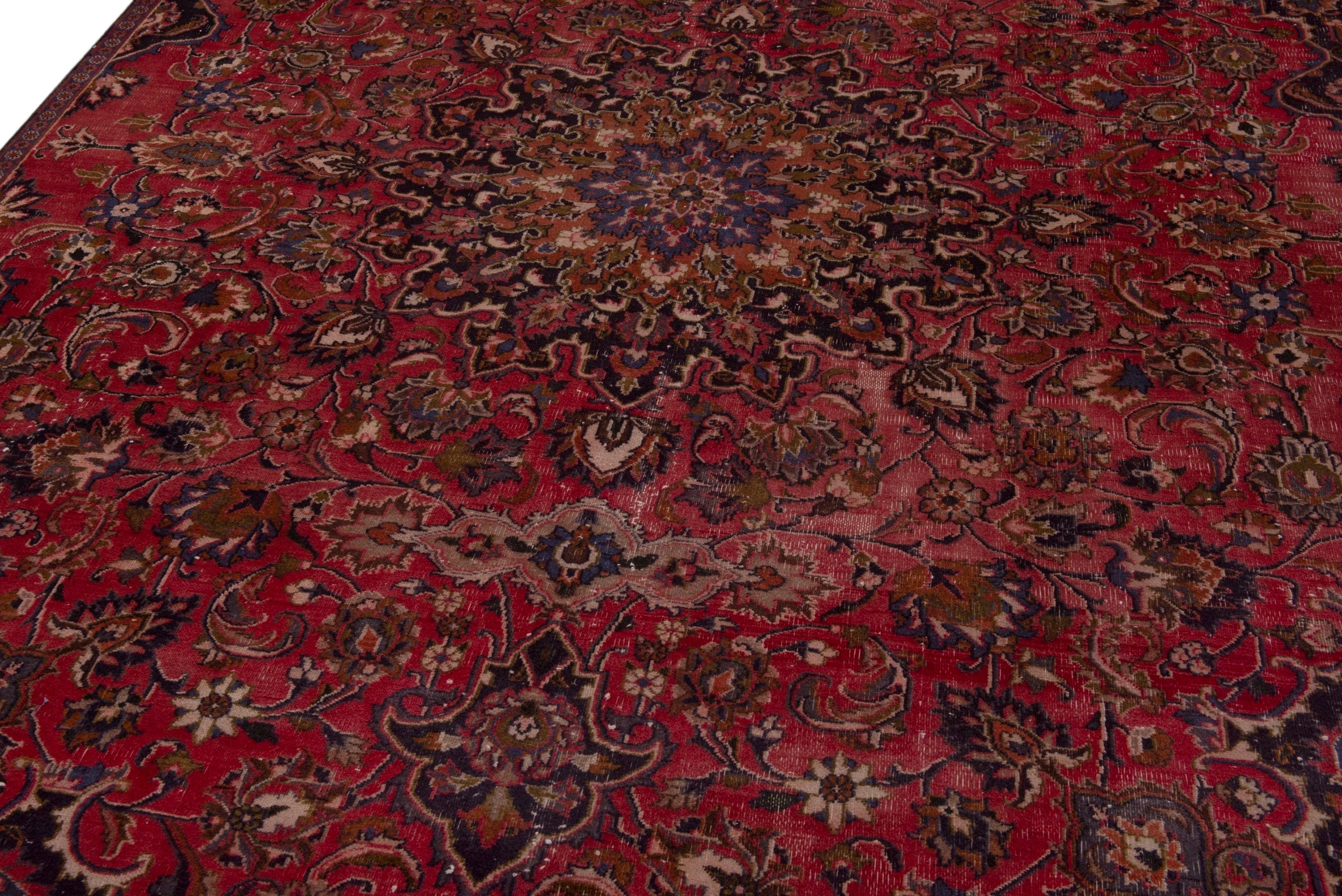 Persian Mashhad area rug in deep red and dark brown, view 9 of 18