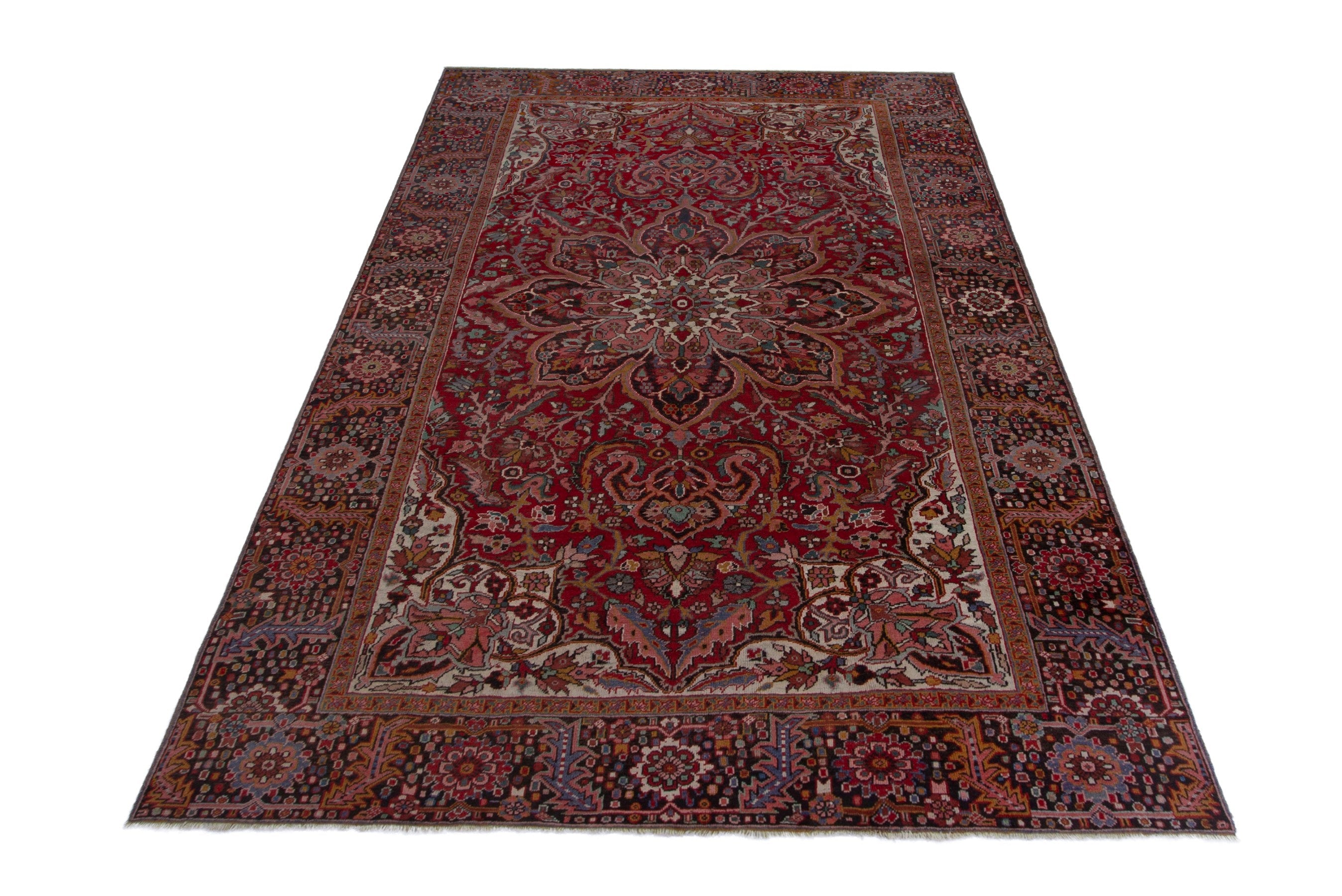 Persian Heriz oversized rug in deep red and dark brown, view 3 of 20