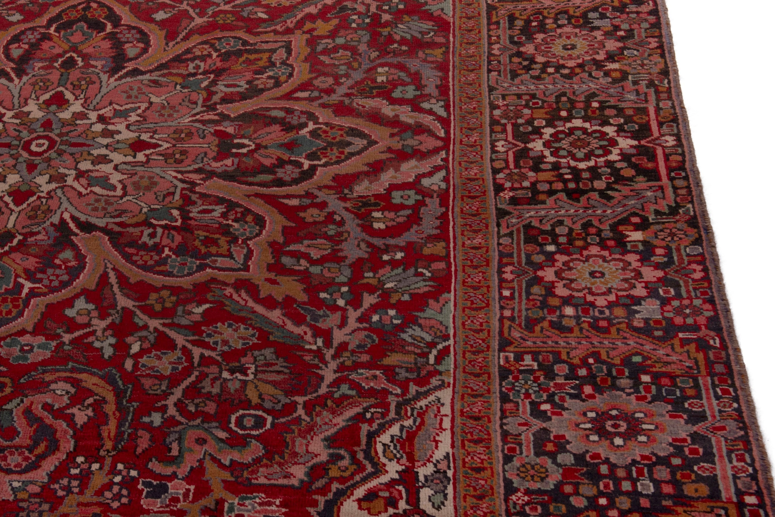 Persian Heriz oversized rug in deep red and dark brown, view 7 of 20