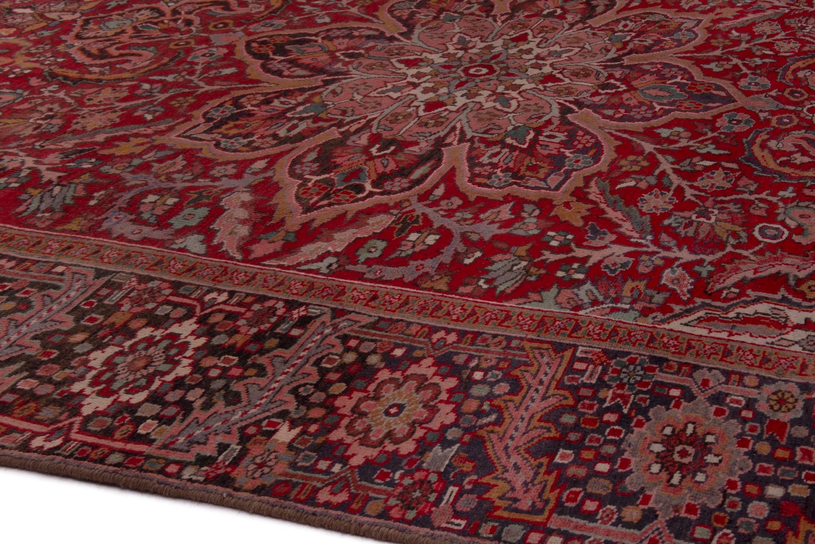 Persian Heriz oversized rug in deep red and dark brown, view 8 of 20