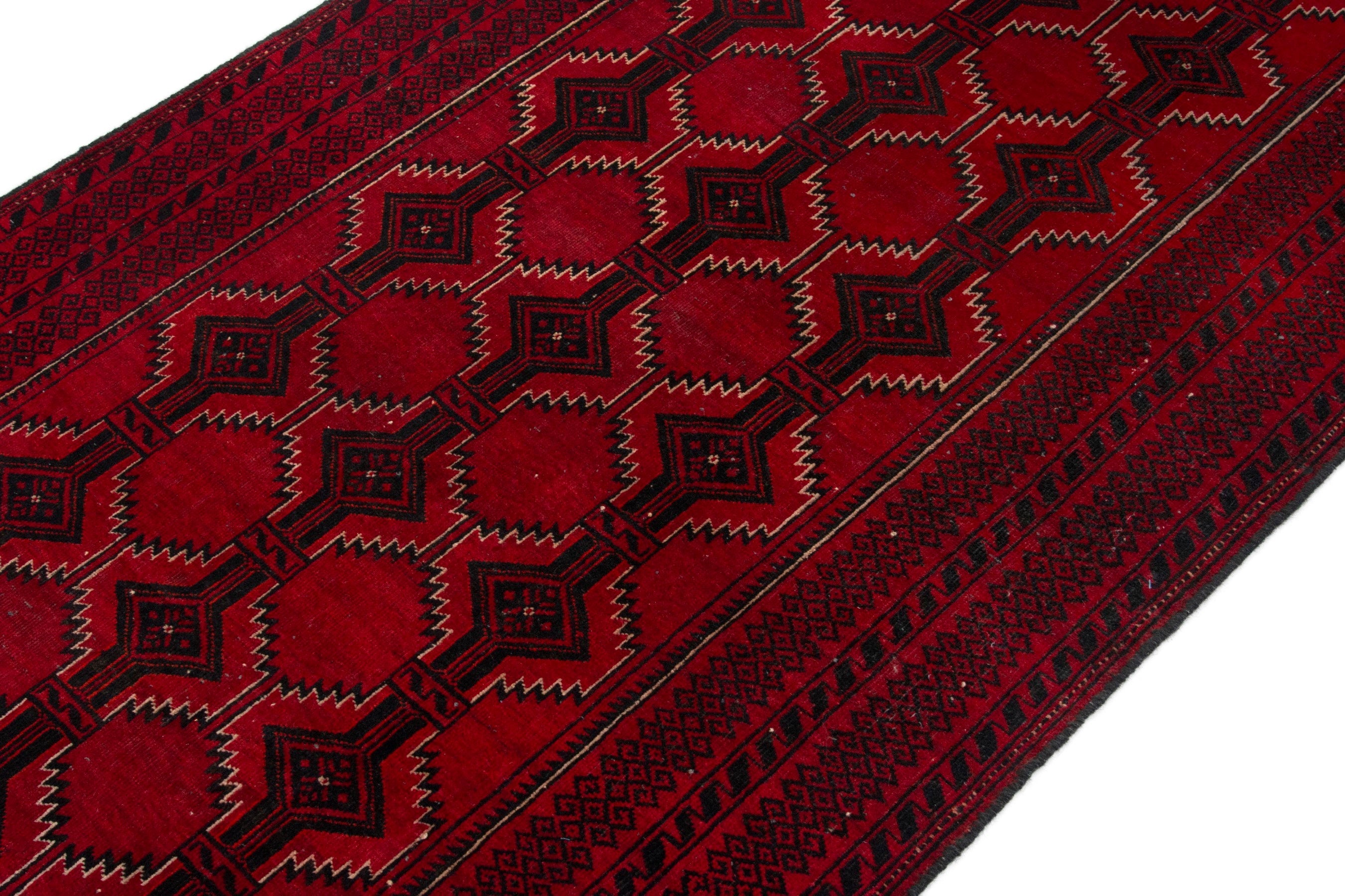 Persian Baluch accent rug in burgundy and deep red, view 4 of 17