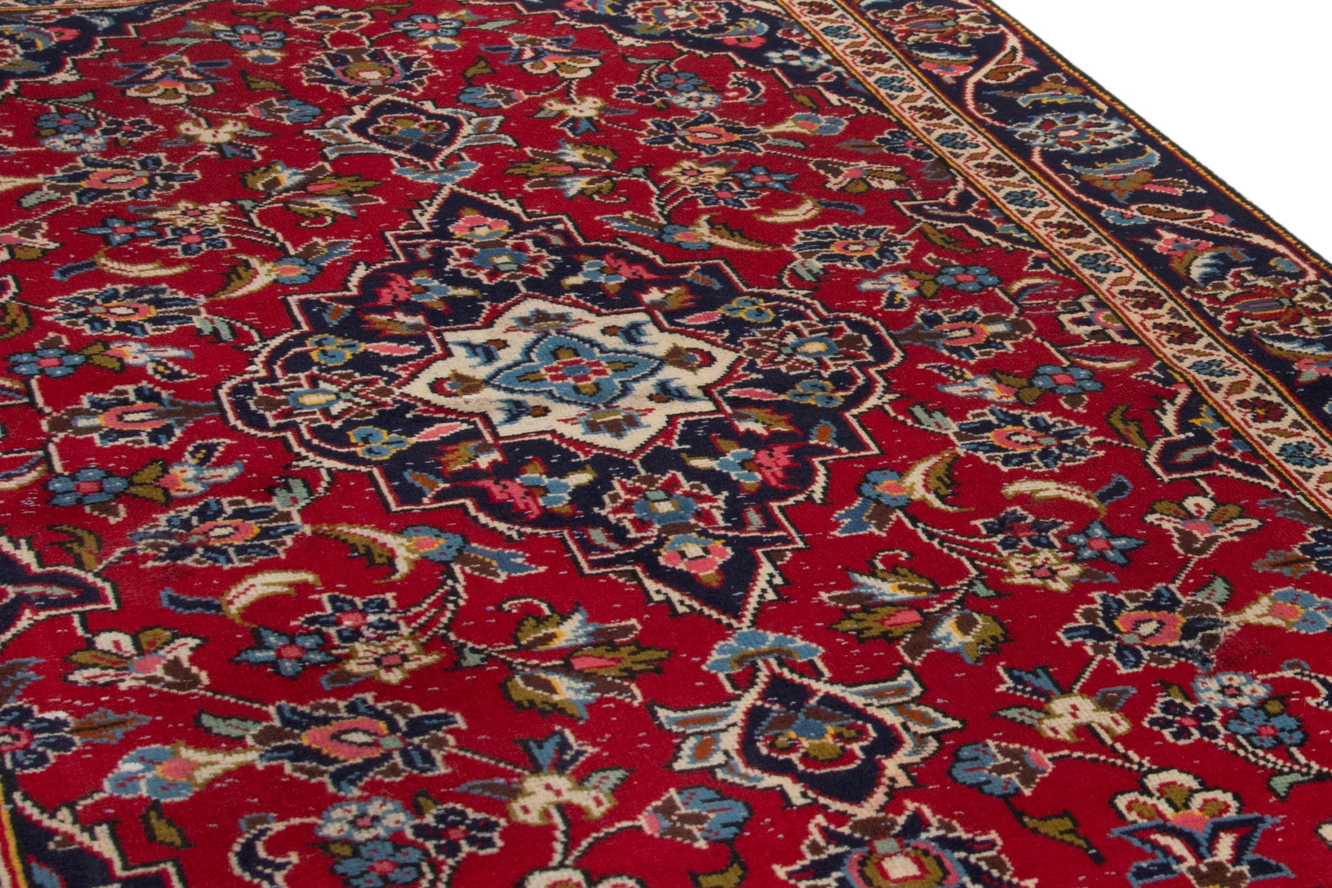 Persian Kashan accent rug in deep red and navy, view 10 of 17