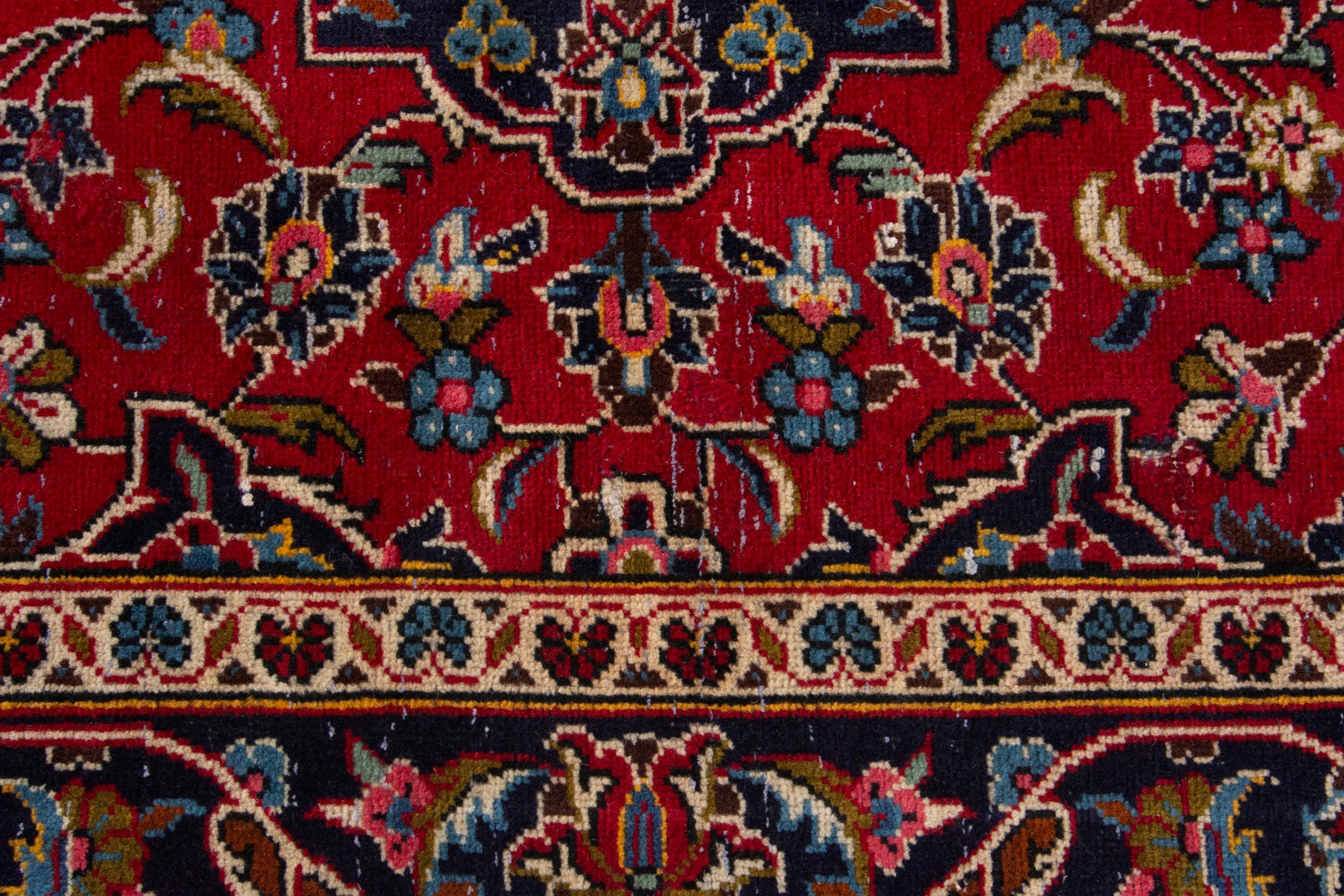 Persian Kashan accent rug in deep red and navy, view 12 of 17