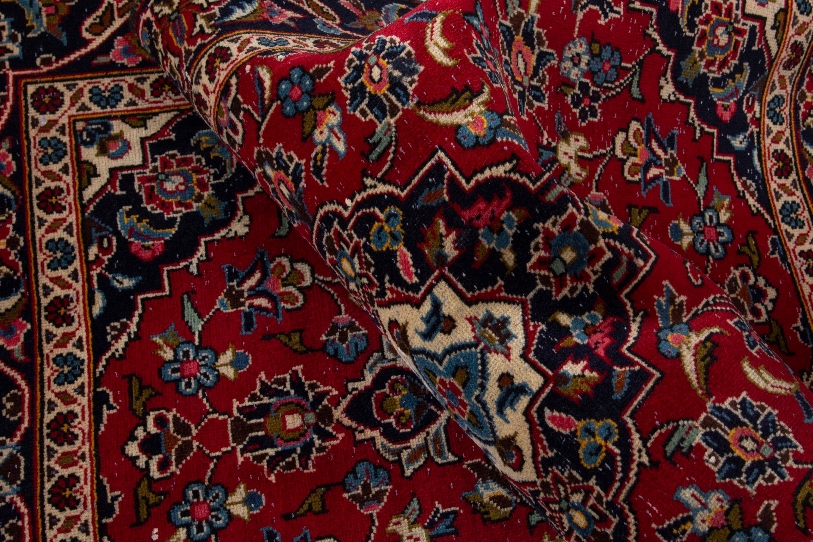 Persian Kashan accent rug in deep red and navy, view 14 of 17
