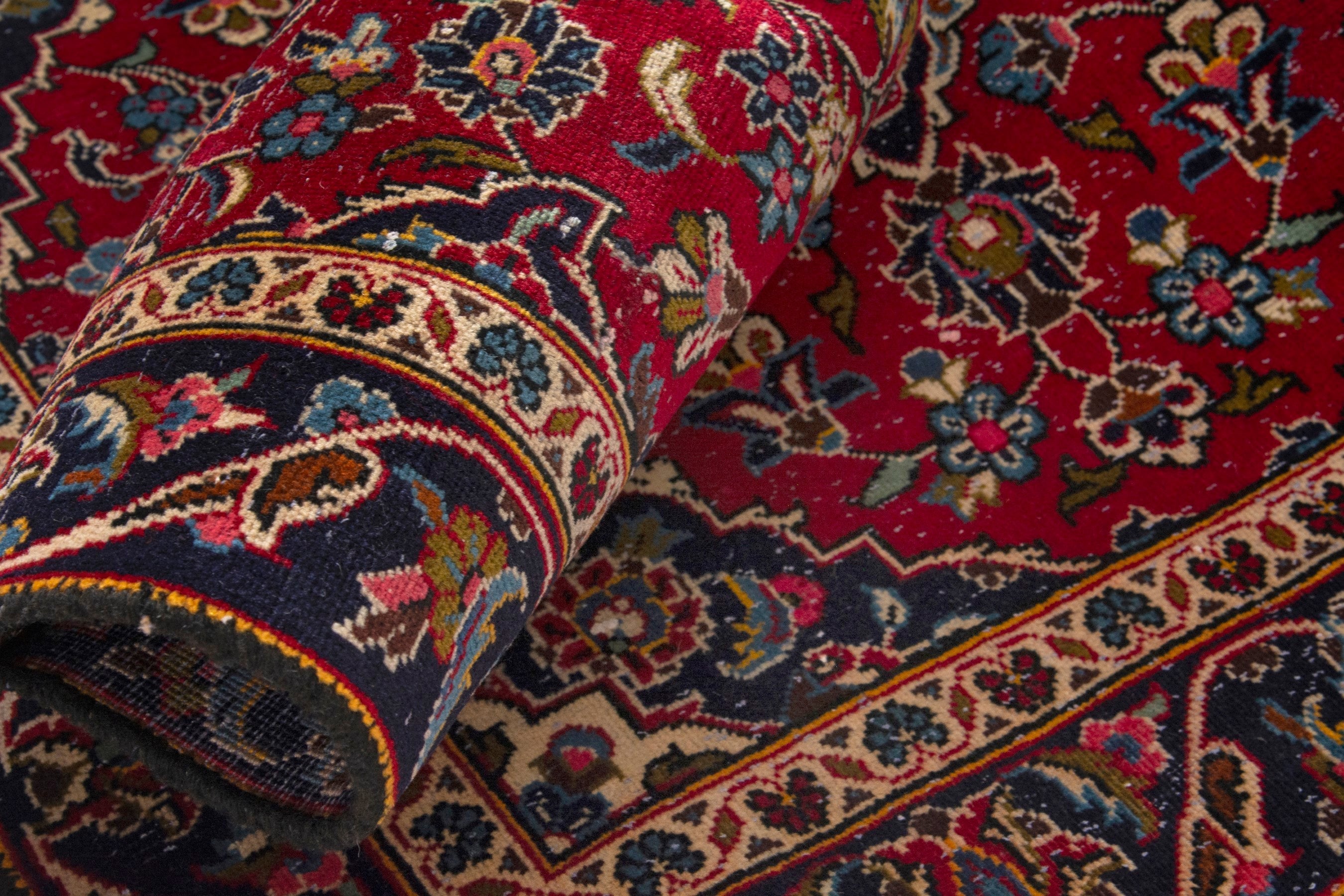 Persian Kashan accent rug in deep red and navy, view 15 of 17